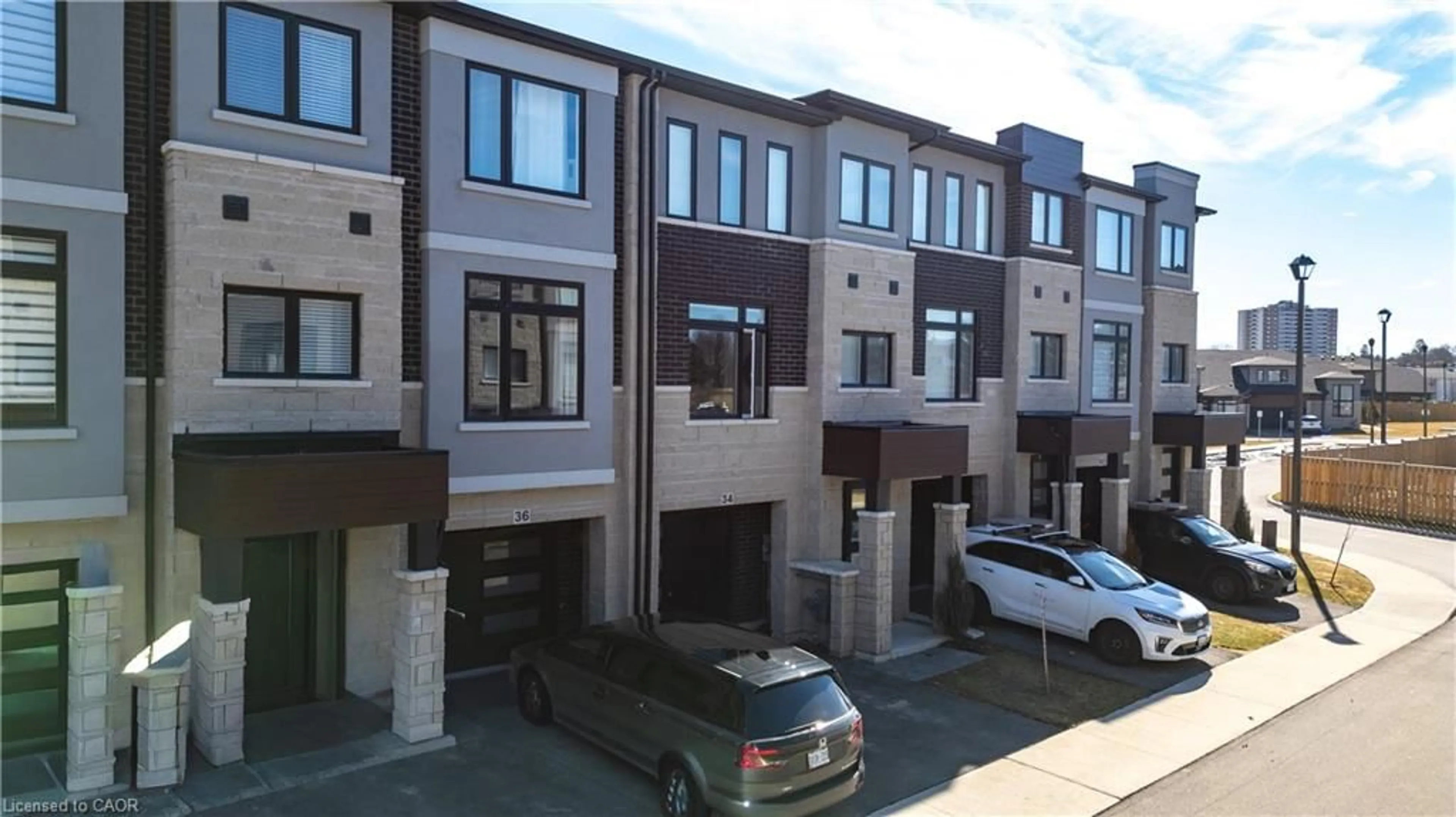 A pic from outside/outdoor area/front of a property/back of a property/a pic from drone, street for 34 Capstone Lane, Hamilton Ontario L9C 0E8