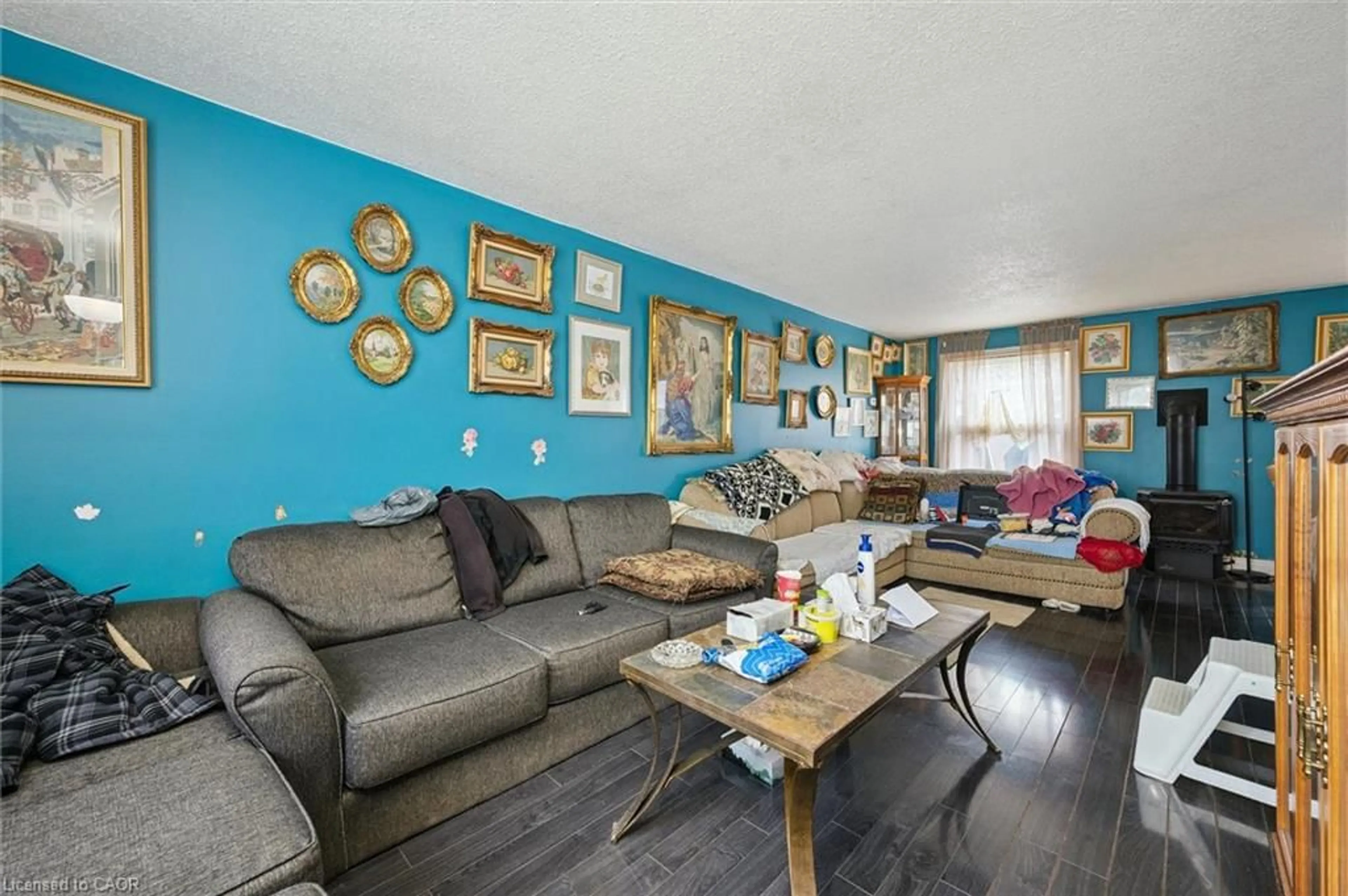 Living room with furniture, wood/laminate floor for 647 Albert St #4, Waterloo Ontario N2L 3V5