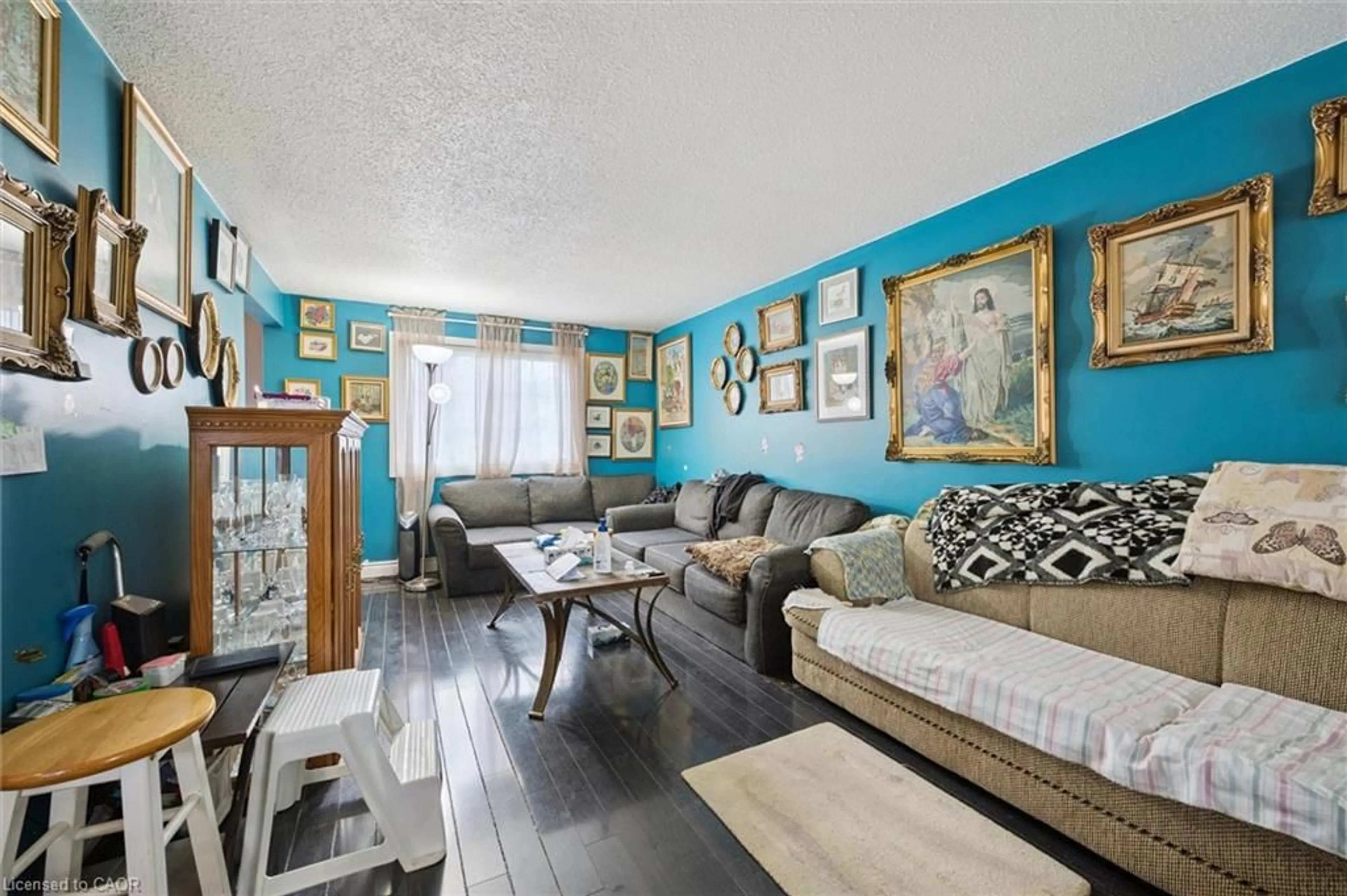 Living room with furniture, wood/laminate floor for 647 Albert St #4, Waterloo Ontario N2L 3V5