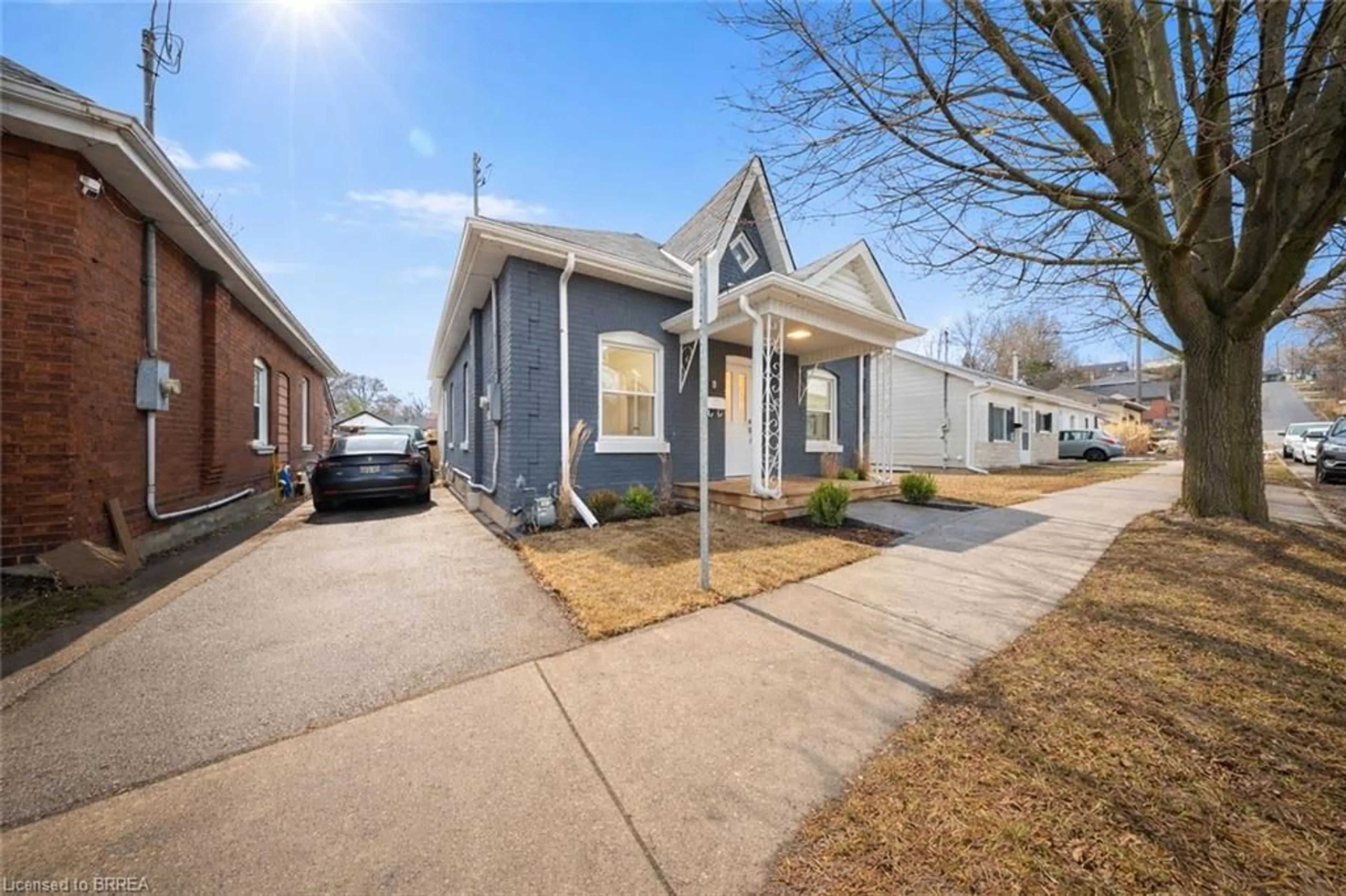 Home with brick exterior material, street for 8 Main St, Brantford Ontario N3R 3X2