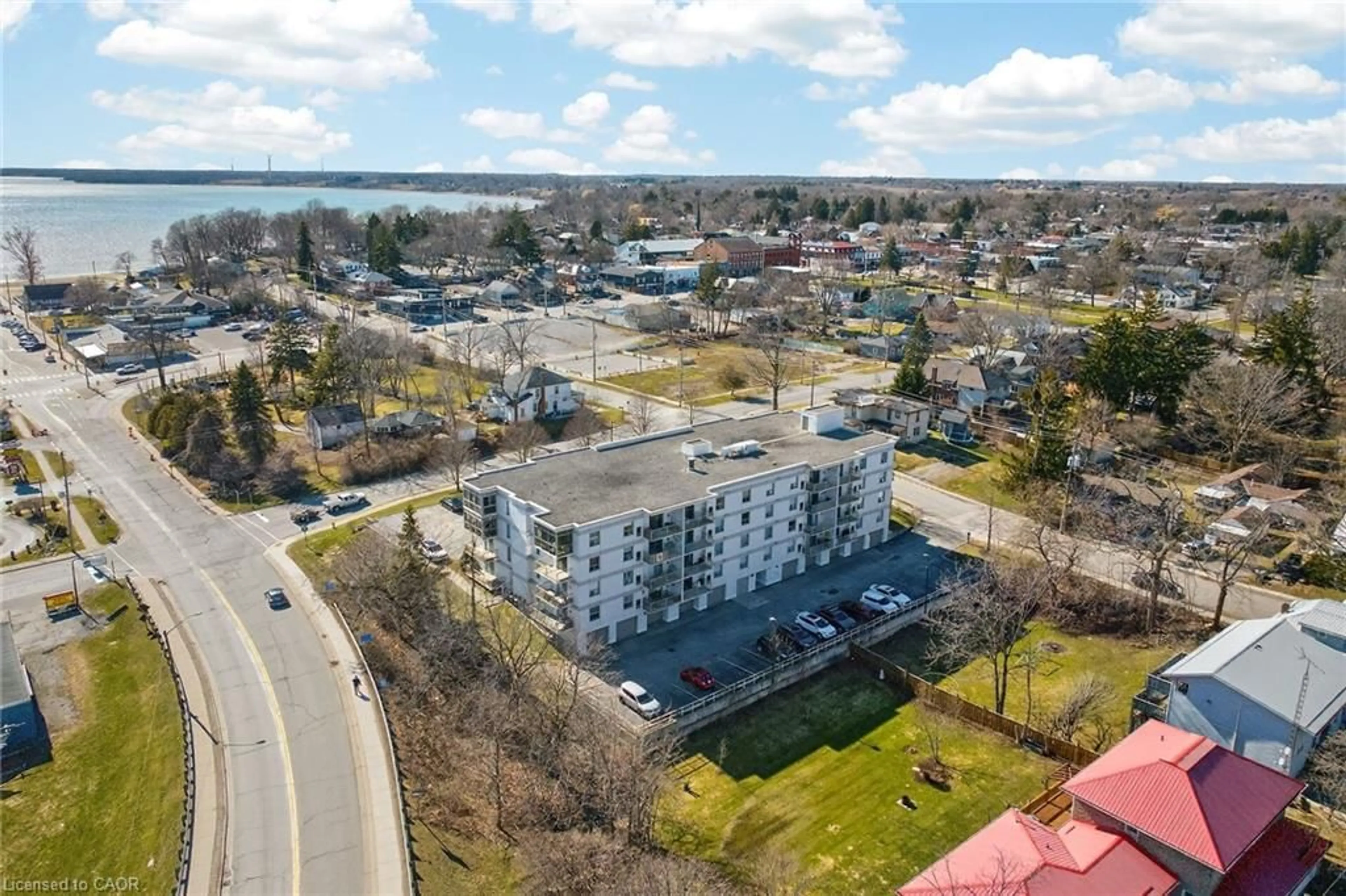 A pic from outside/outdoor area/front of a property/back of a property/a pic from drone, water/lake/river/ocean view for 12 St Andrew St #205, Port Dover Ontario N0A 1N1