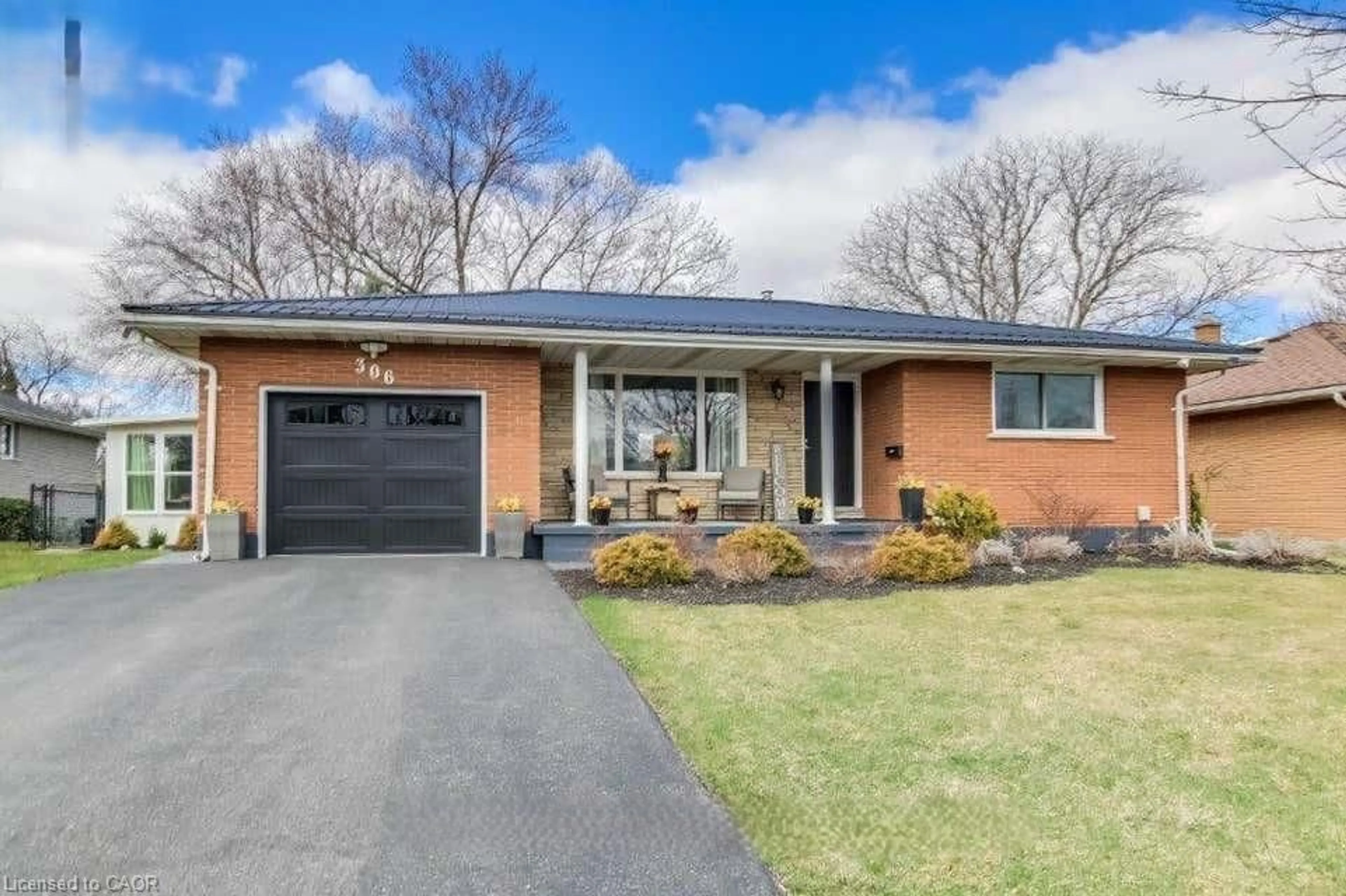 Home with brick exterior material, street for 306 Adams Ave, Delhi Ontario N4B 2Y5