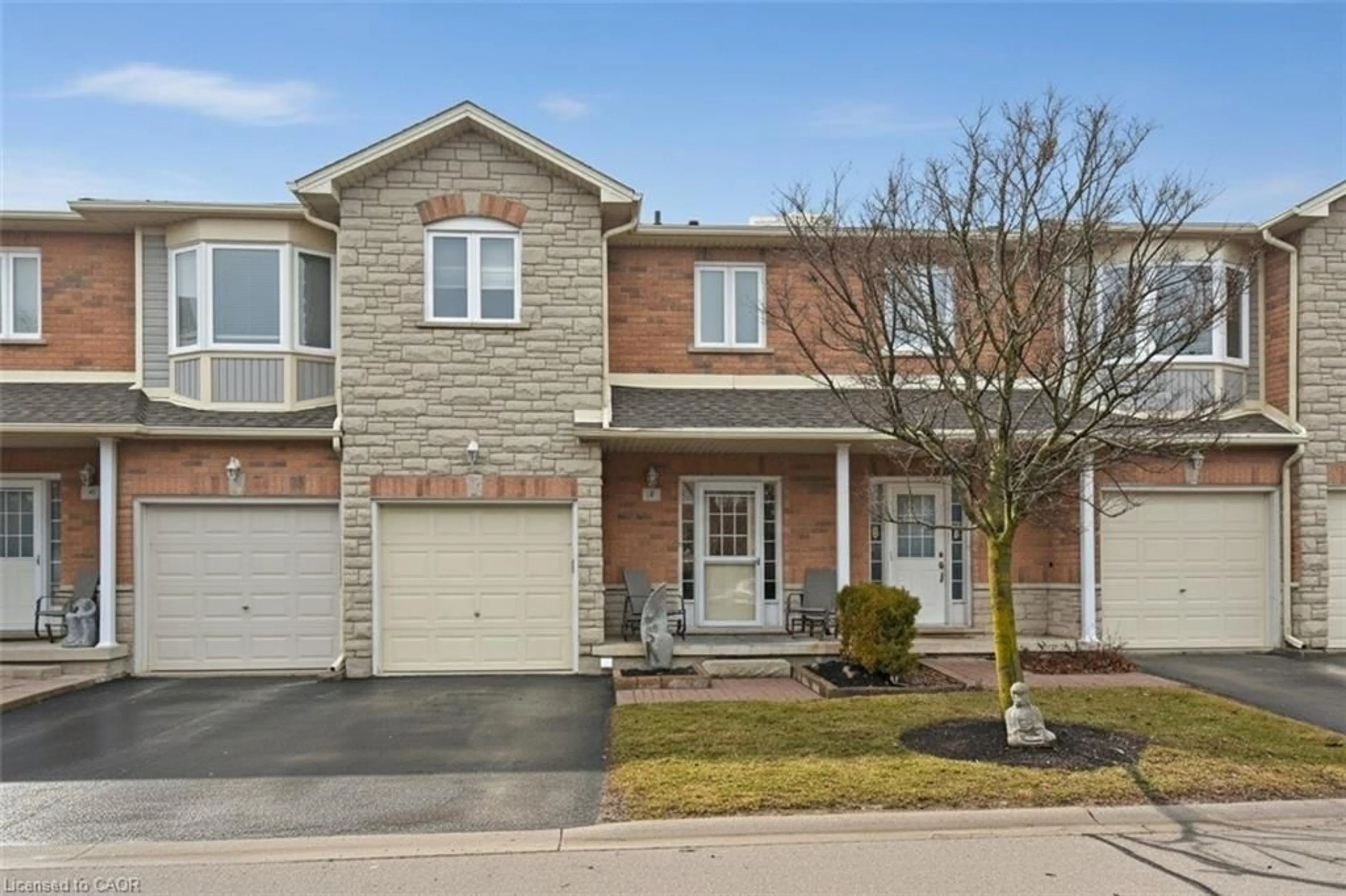 Home with brick exterior material, street for 2229 Walkers Line #9, Burlington Ontario L7M 4X4