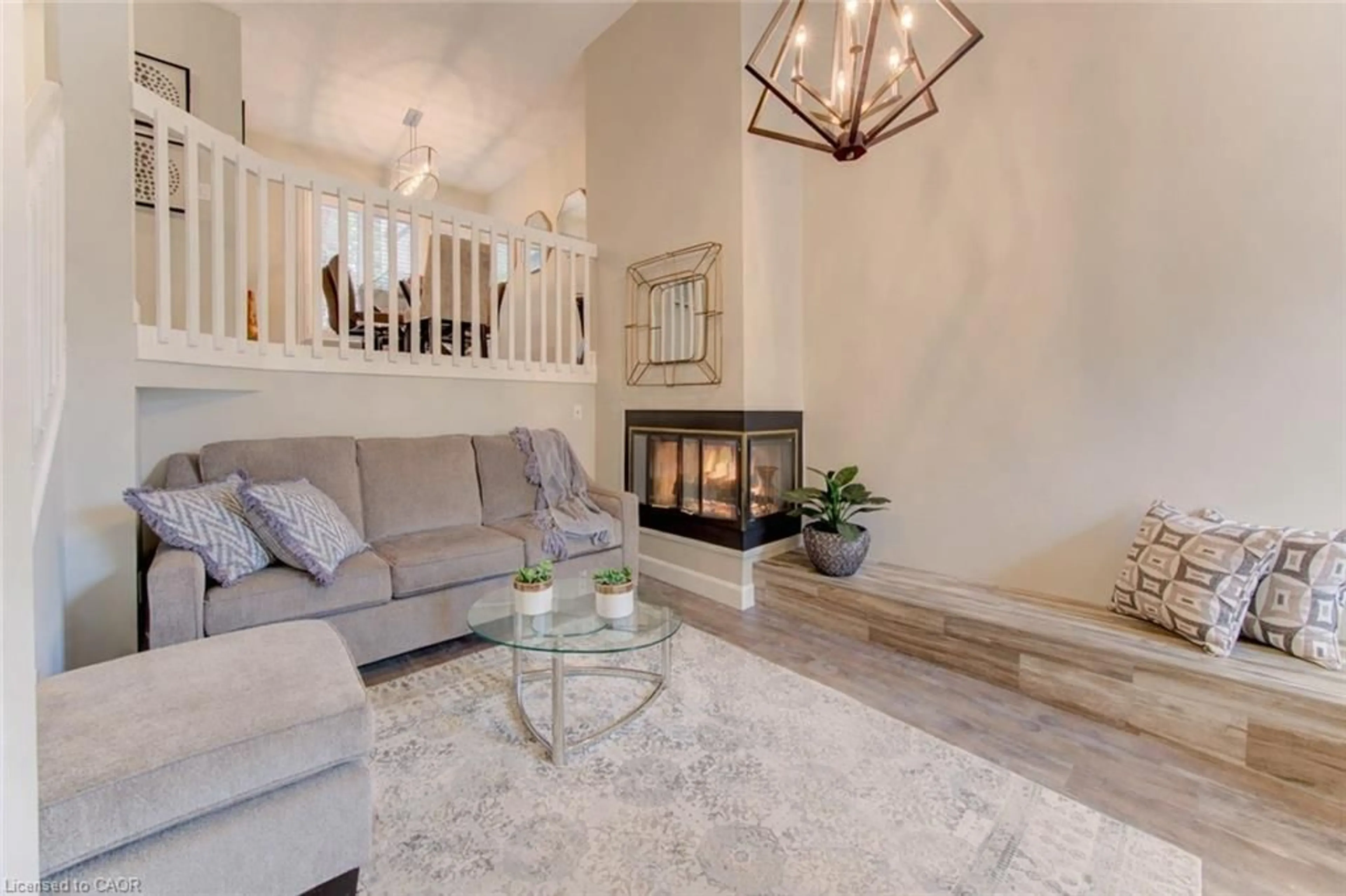 Living room with furniture, ceramic/tile floor for 225 Benjamin Rd #61, Waterloo Ontario N2V 1Z3