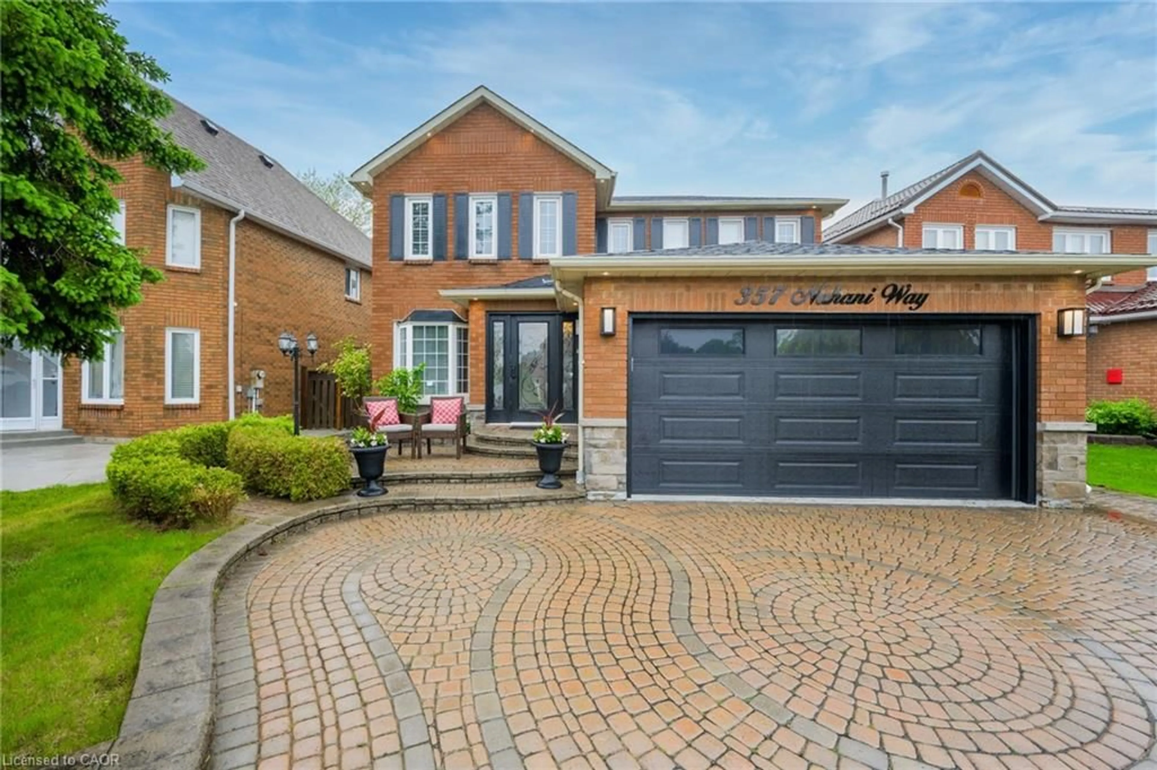 Home with brick exterior material, street for 357 Nahani Way, Mississauga Ontario L4Z 3B1