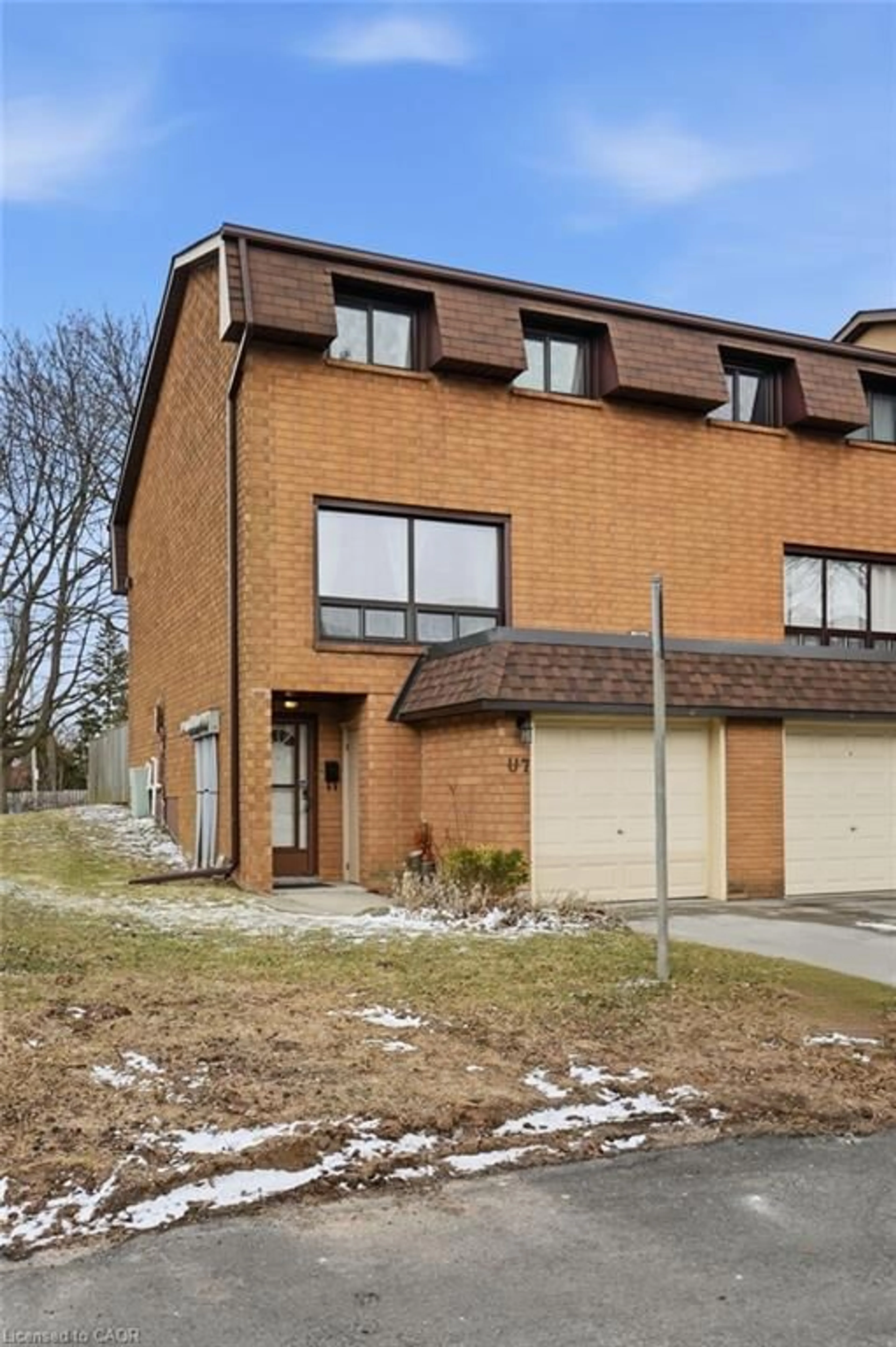 Home with brick exterior material, street for 444 Stone Church Rd #7, Hamilton Ontario L9B 1R1
