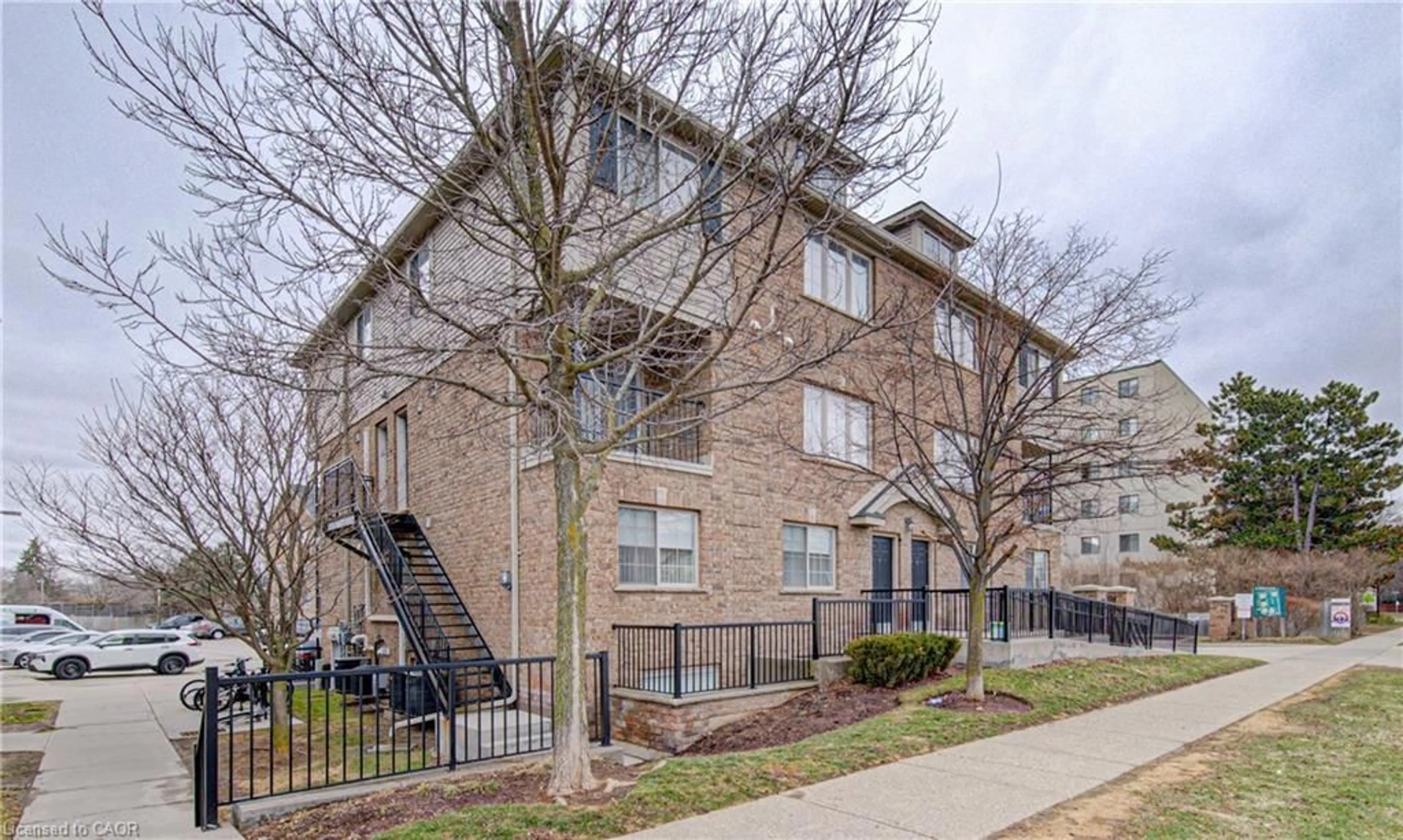 Home with brick exterior material, street for 12 Holborn Dr #8A, Kitchener Ontario N2A 0A4