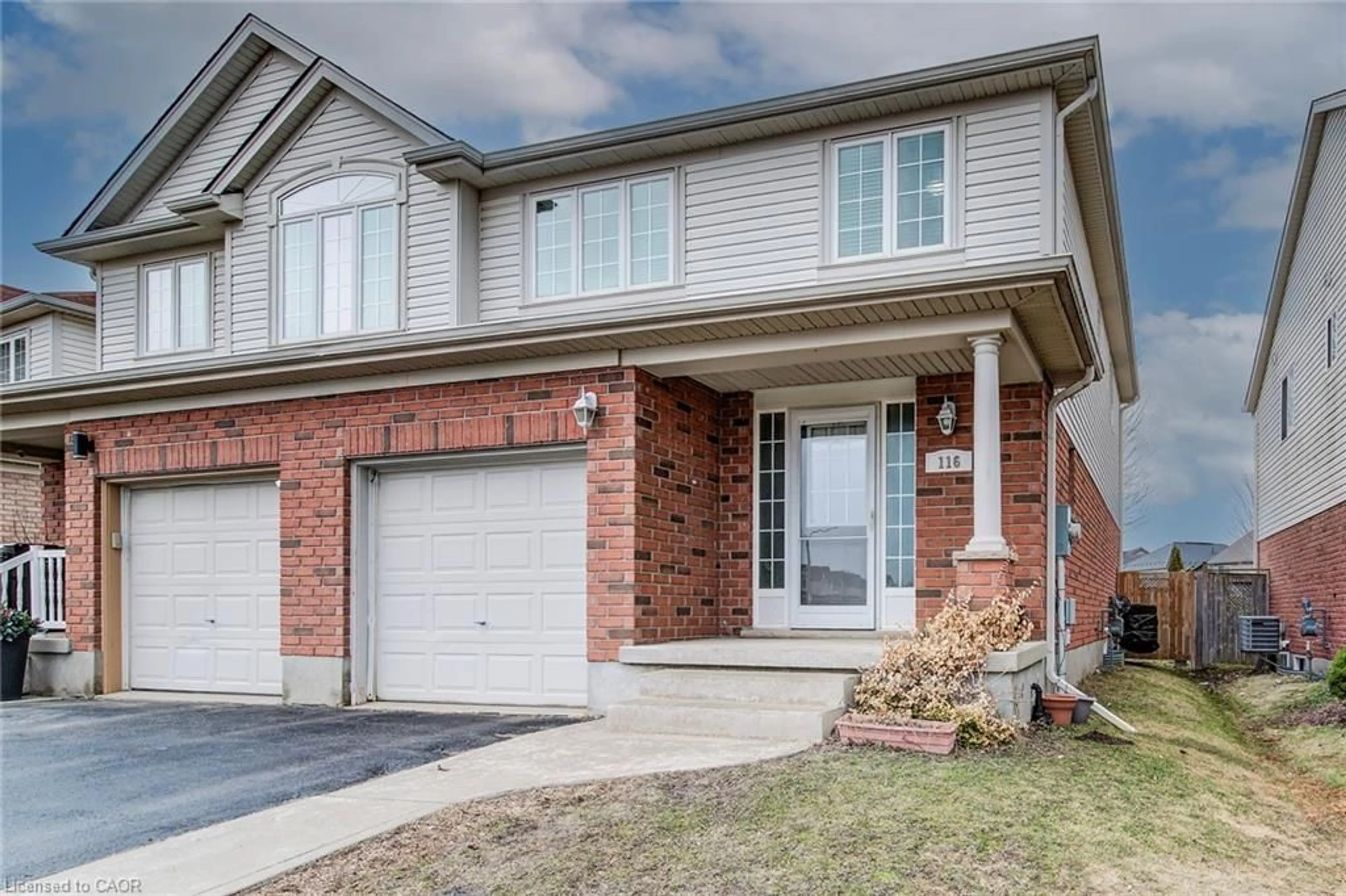 Home with brick exterior material, street for 116 Commonwealth St, Kitchener Ontario N2E 4K8