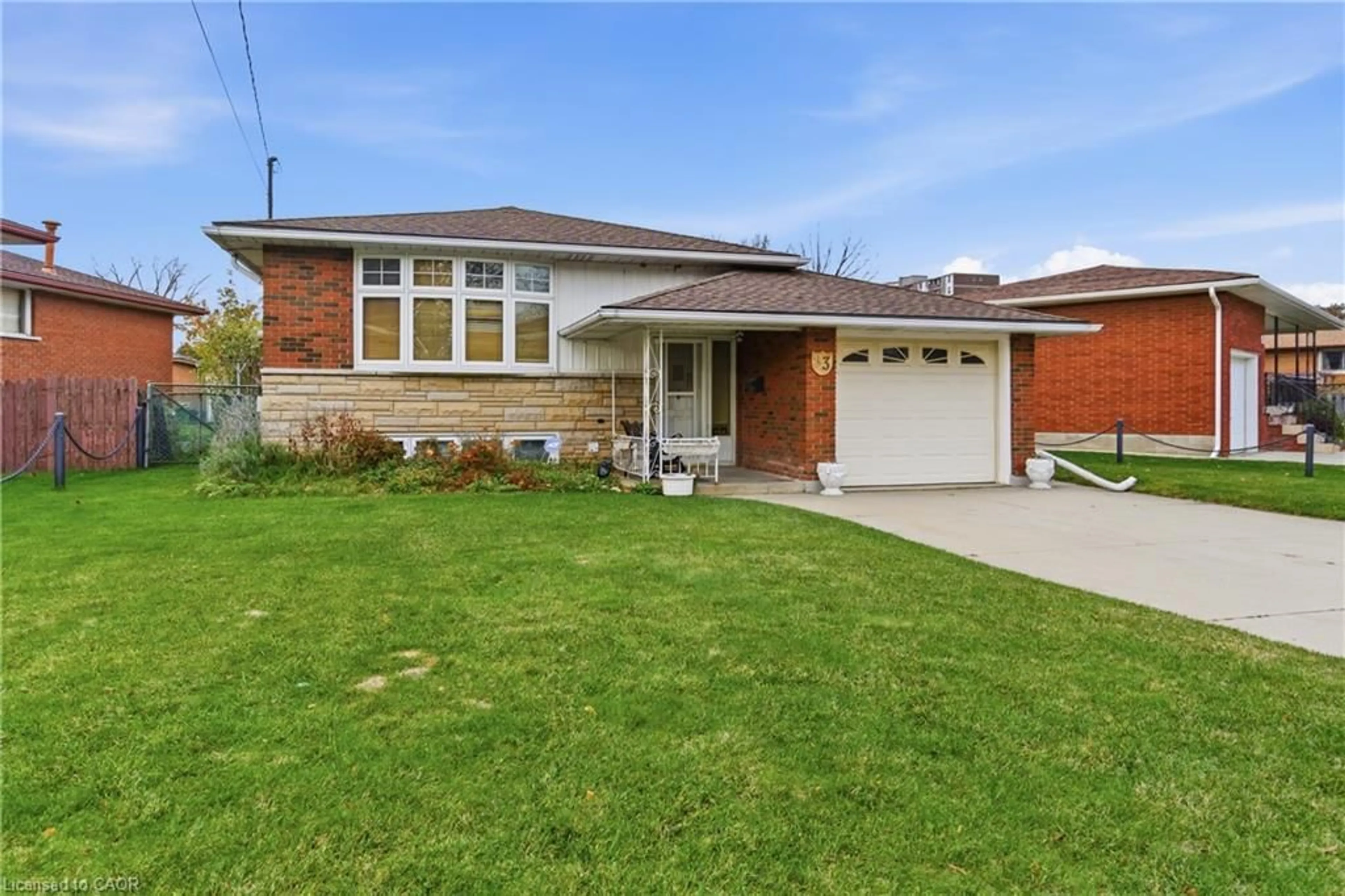 Home with brick exterior material, street for 83 Riverdale Dr, Hamilton Ontario L8E 1K2