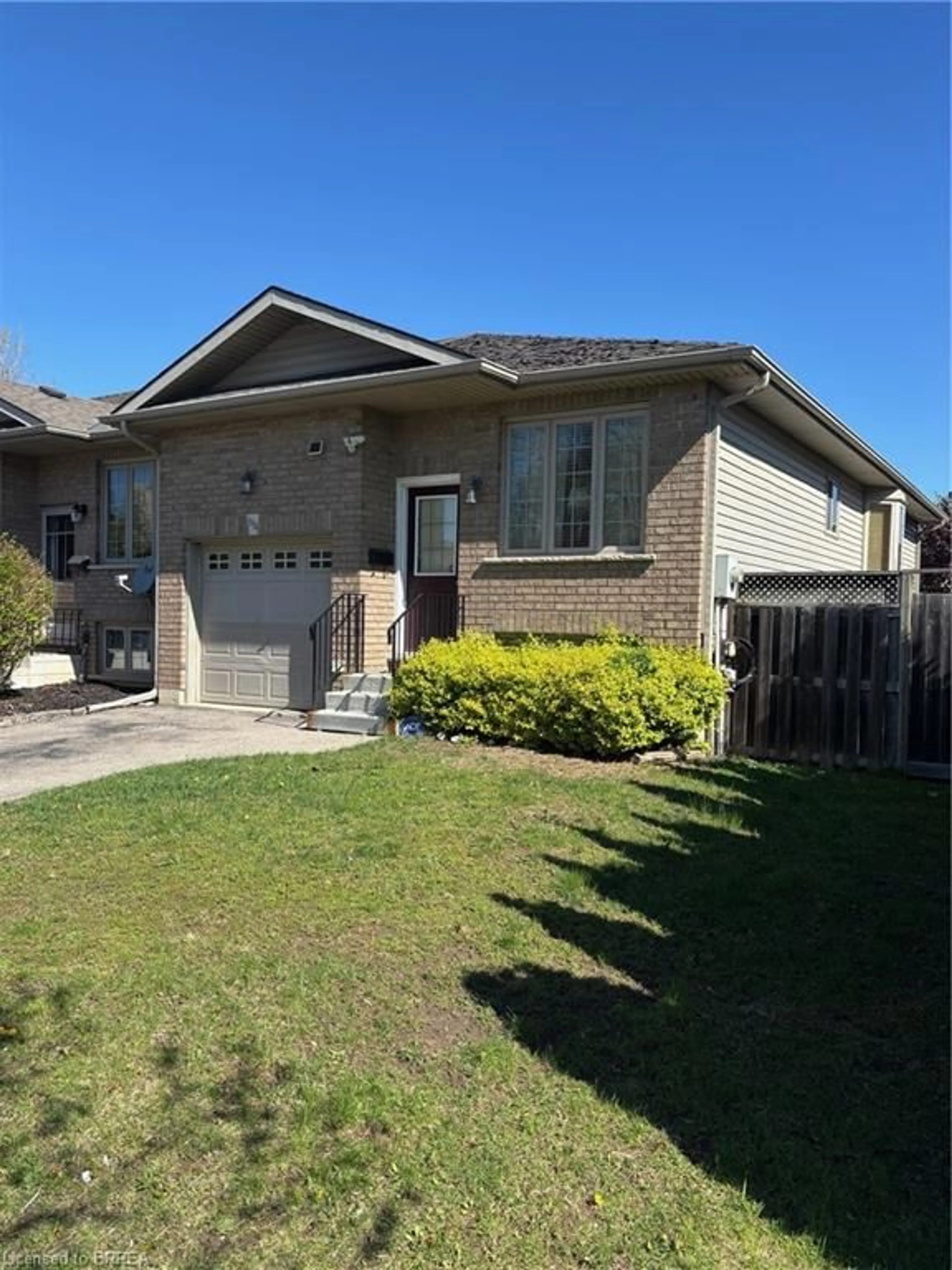 Home with brick exterior material, street for 594 Grey St, Brantford Ontario N3S 4Y1