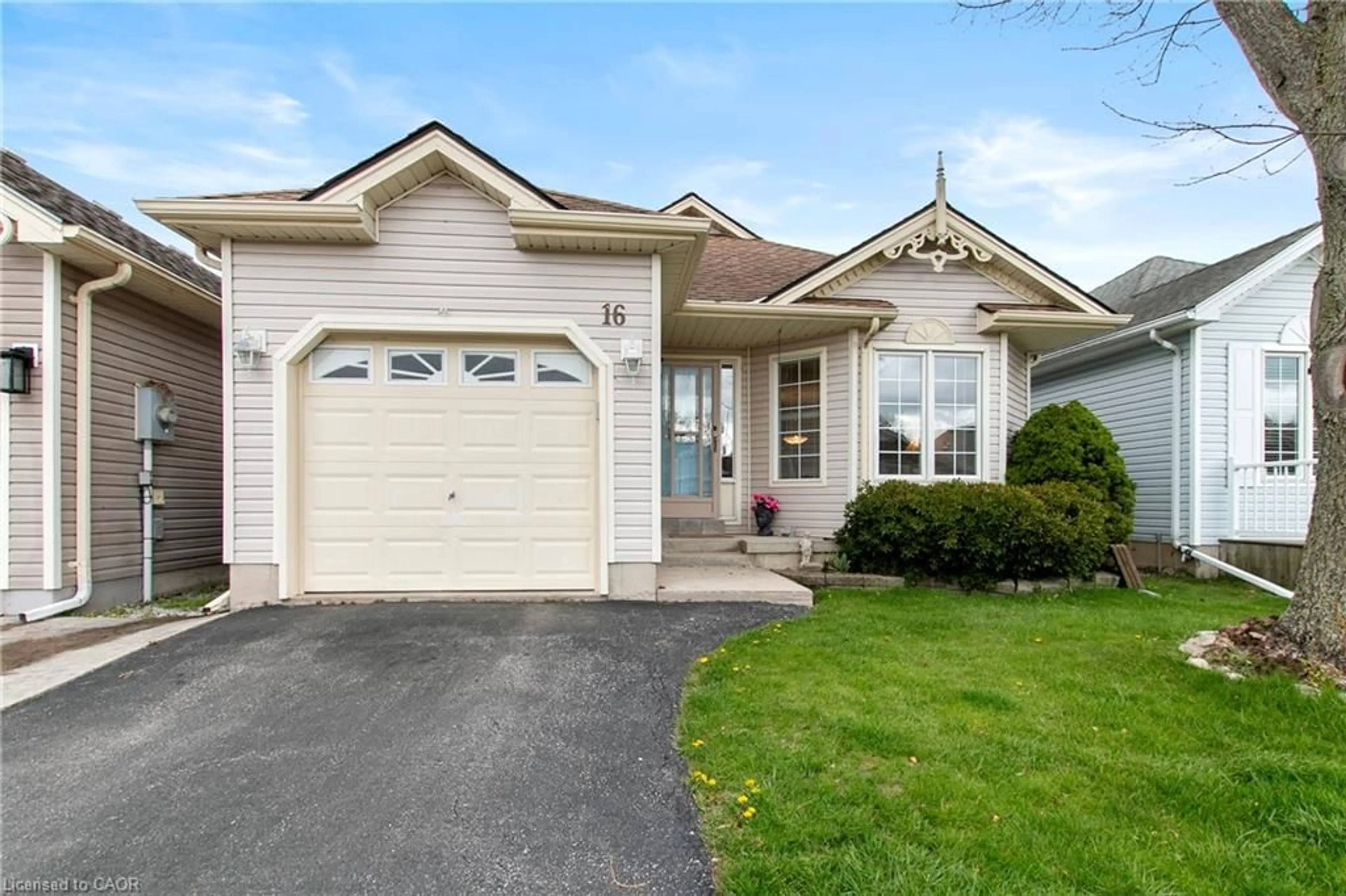 Home with vinyl exterior material, street for 16 Mallard Walk, Port Rowan Ontario N0E 1M0