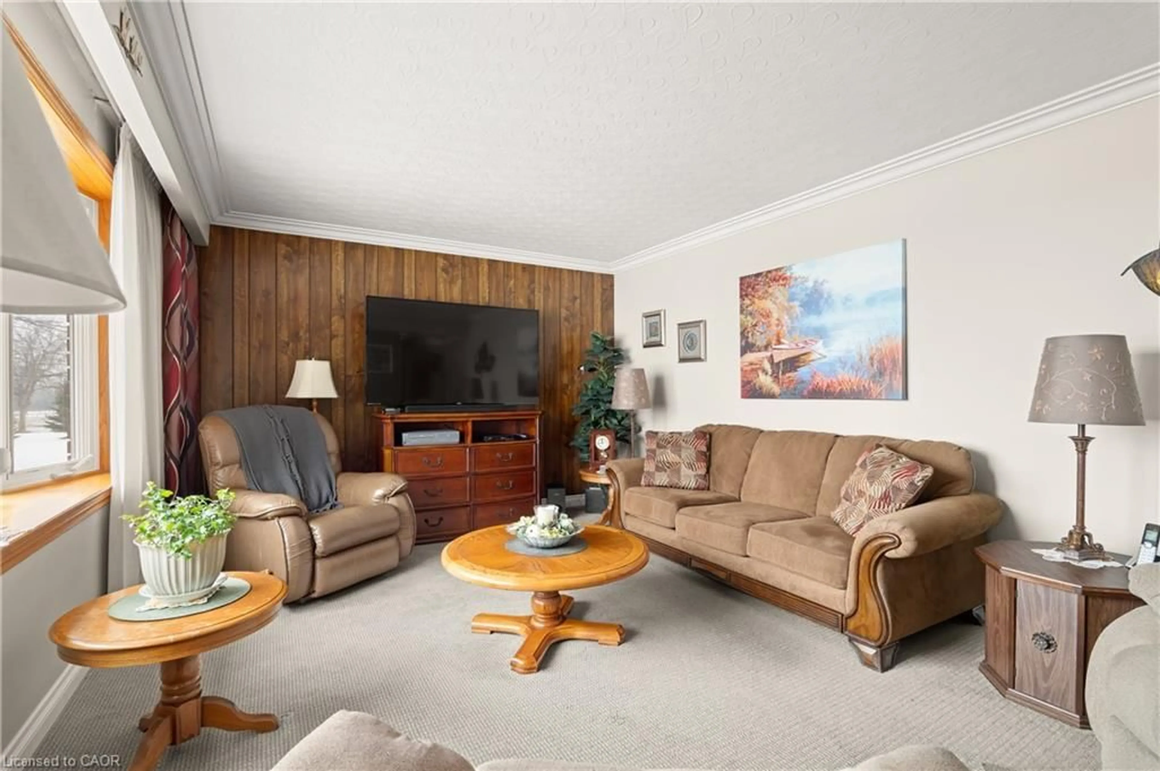Living room with furniture, wood/laminate floor for 6800 Gerrie Rd, Elora Ontario N0B 1S0