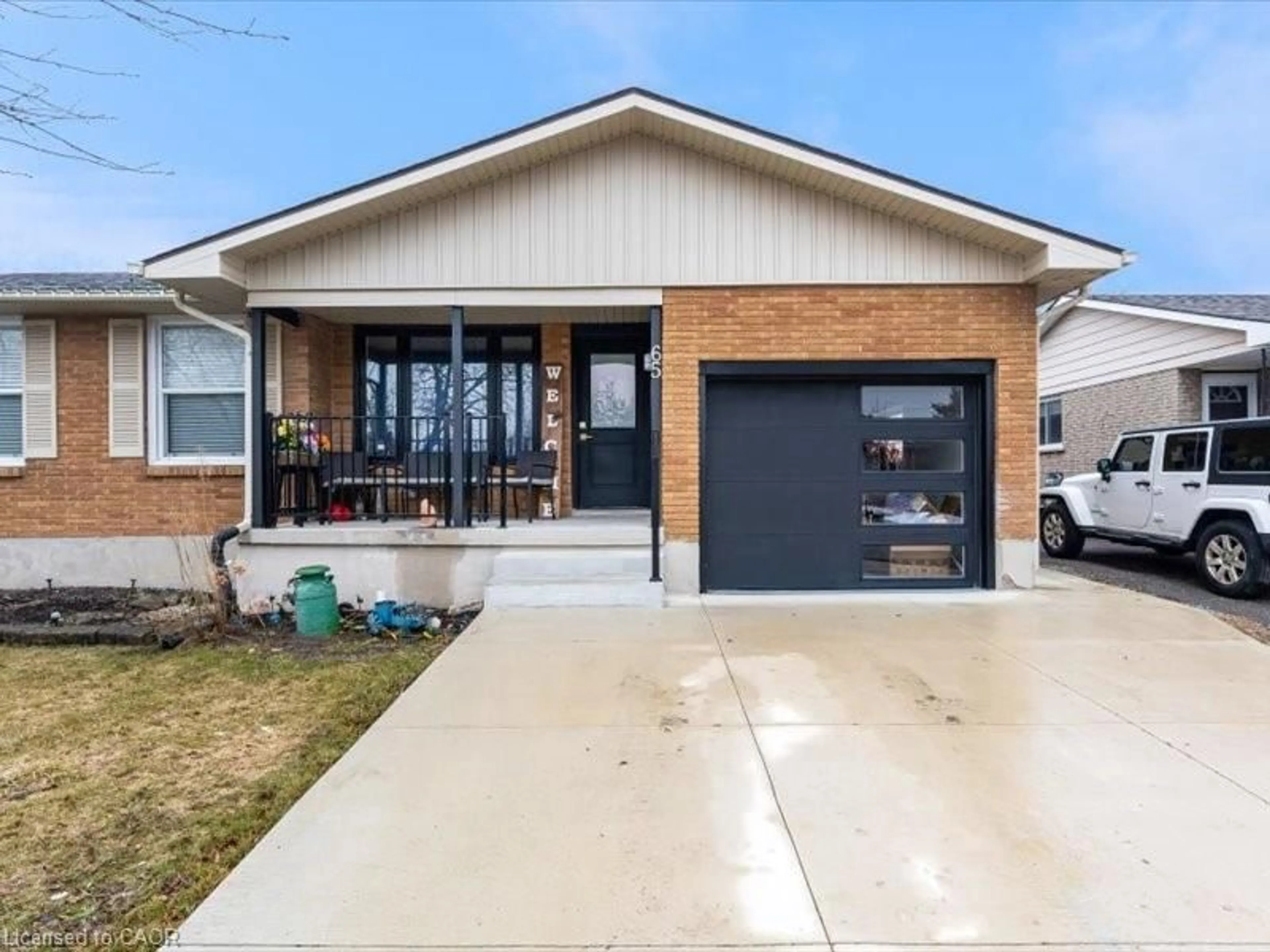 Home with brick exterior material, street for 65 Loraine Dr, St. Catharines Ontario L2P 3P1