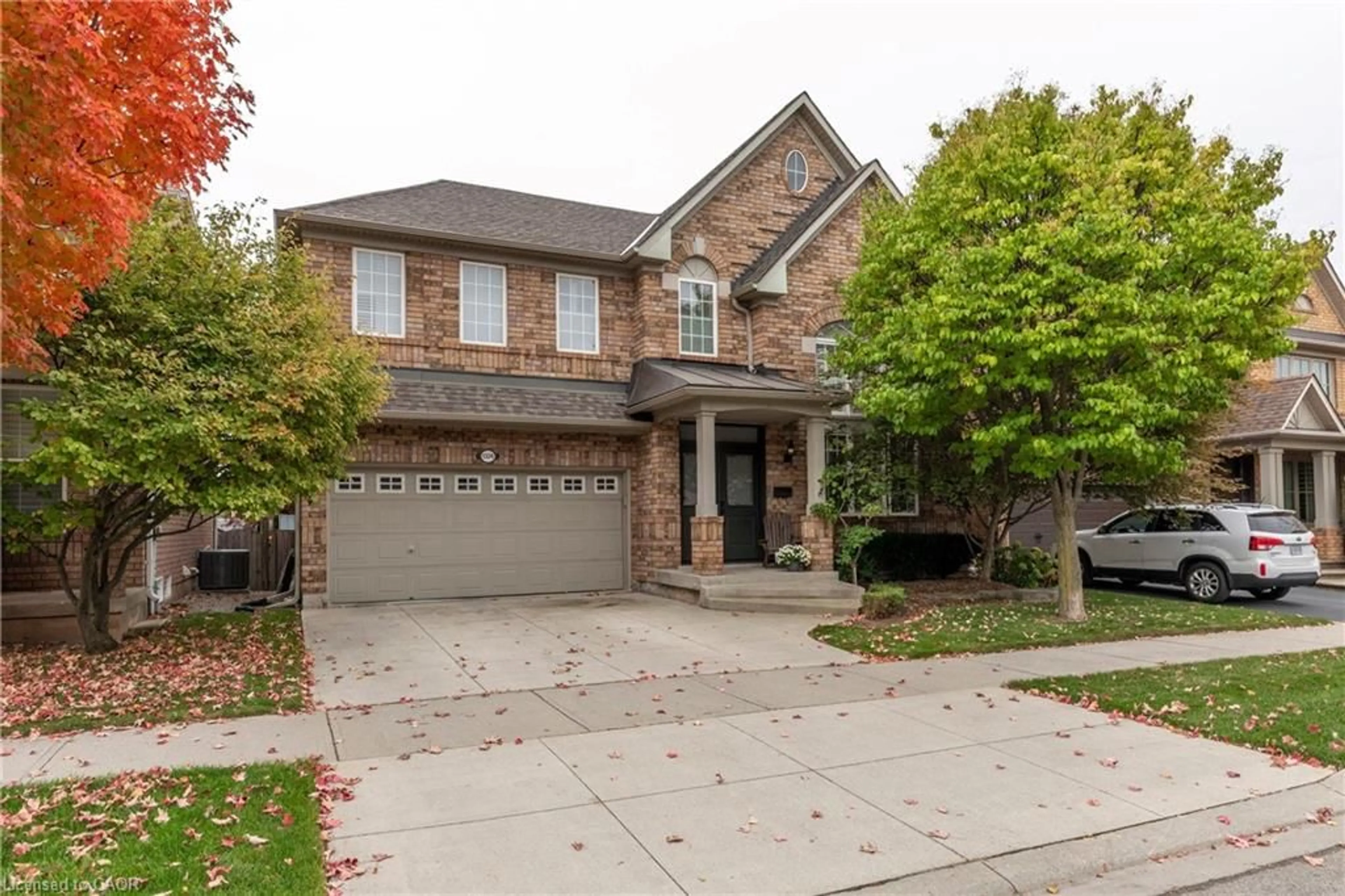 Home with brick exterior material, street for 1326 Pepperbush Pl, Oakville Ontario L6M 4B7