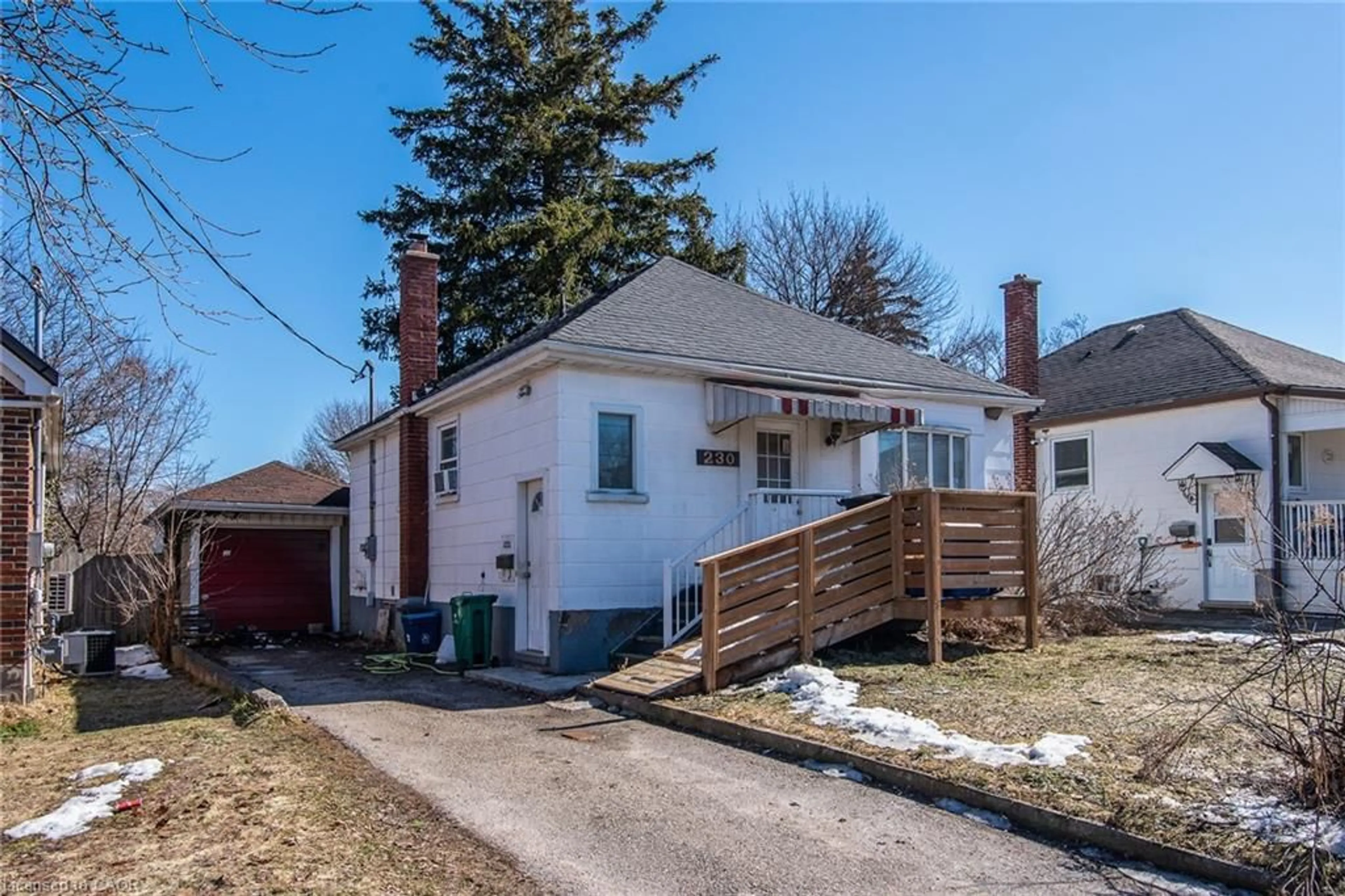 A pic from outside/outdoor area/front of a property/back of a property/a pic from drone, street for 230 Lancaster St, Kitchener Ontario N2H 4V1