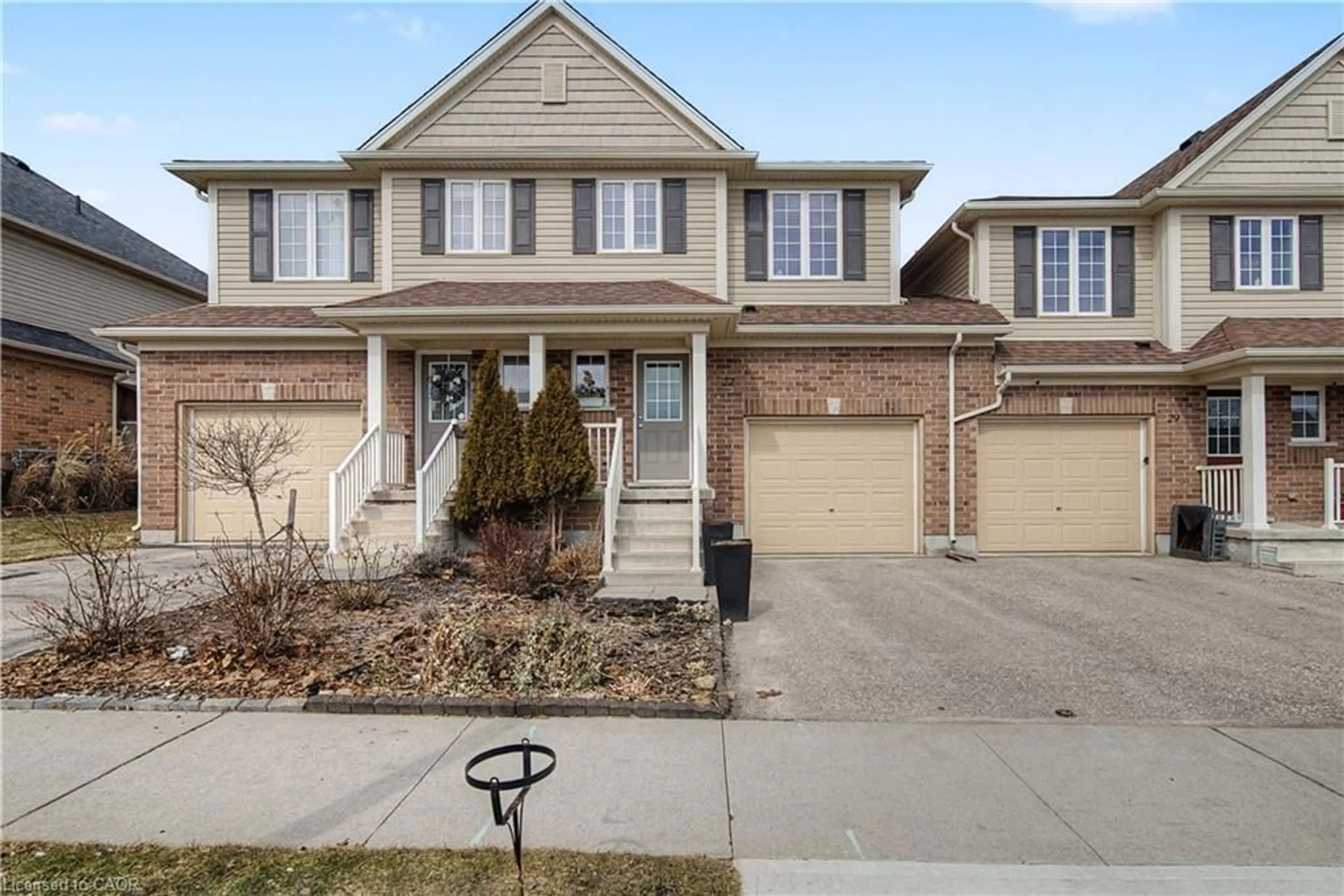 Home with brick exterior material, street for 27 Grand Flats Trail, Kitchener Ontario N2A 0H7