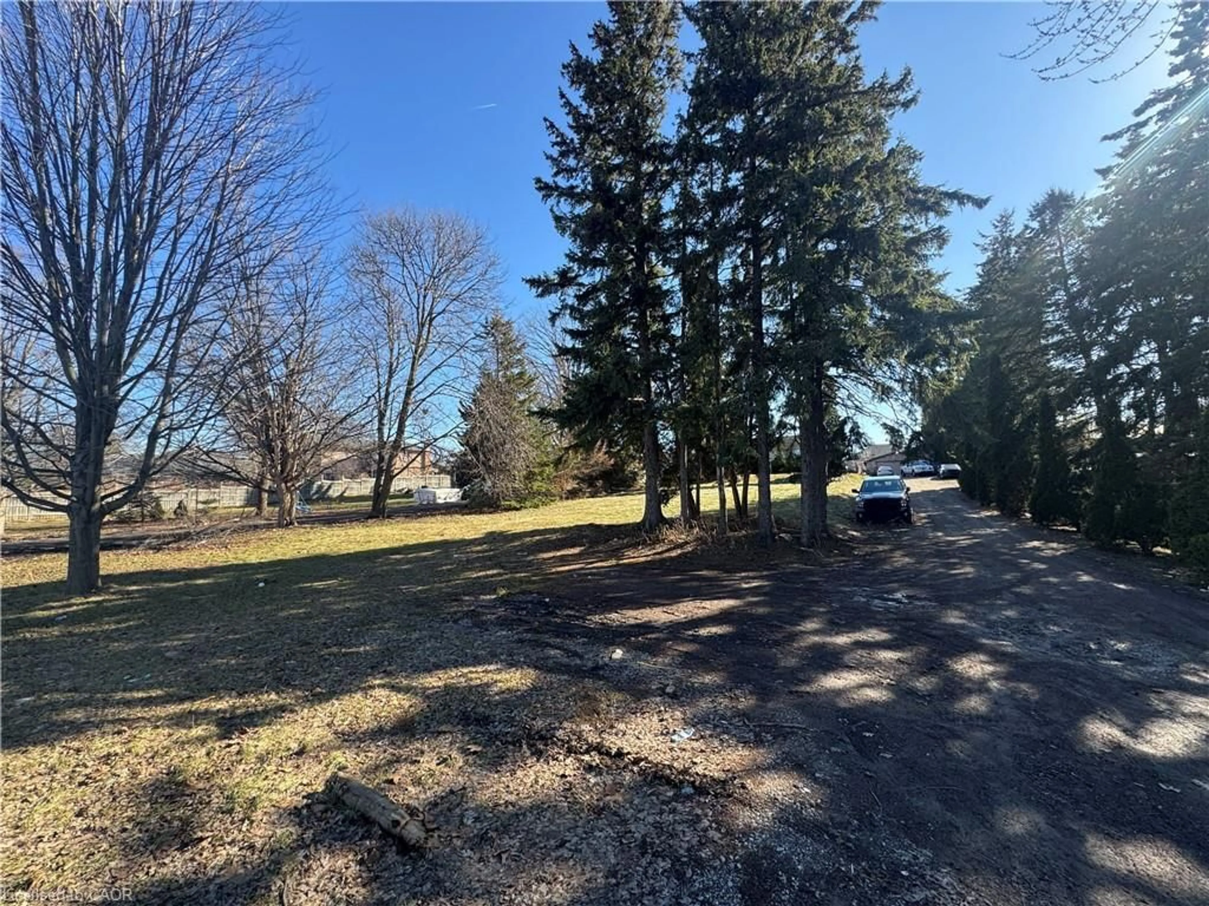 A pic from outside/outdoor area/front of a property/back of a property/a pic from drone, forest/trees view for 613 Rymal Rd, Hamilton Ontario L9B 1B7
