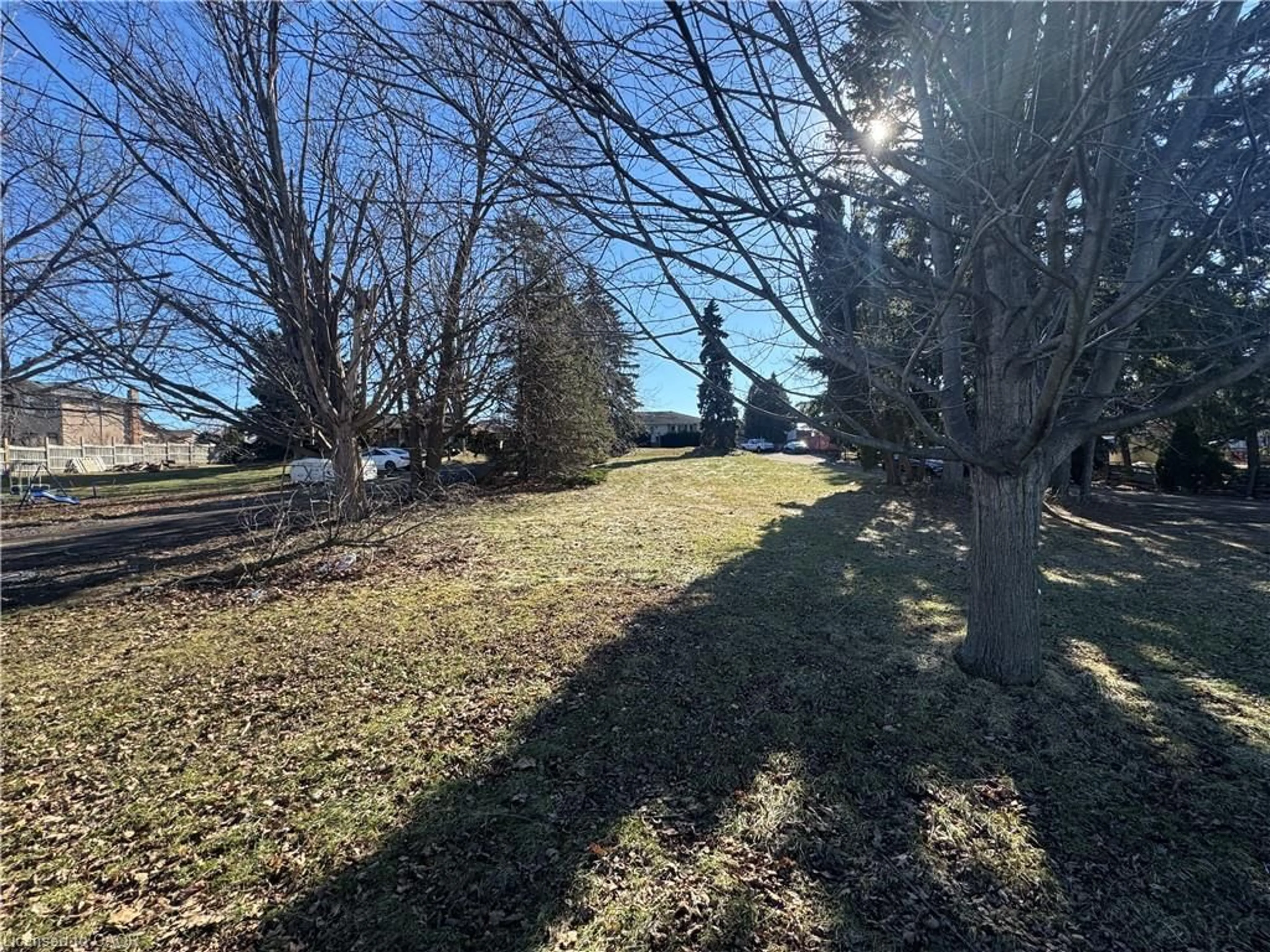 A pic from outside/outdoor area/front of a property/back of a property/a pic from drone, forest/trees view for 613 Rymal Rd, Hamilton Ontario L9B 1B7
