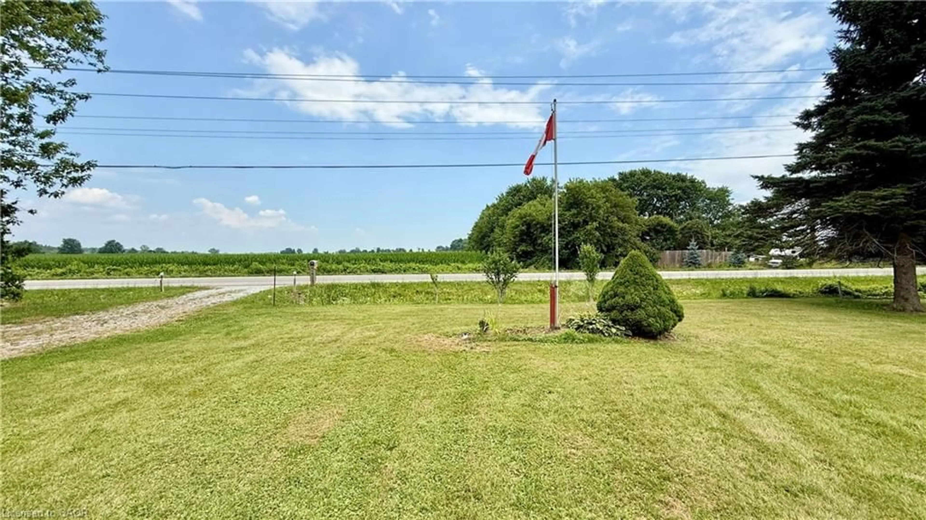 A pic from outside/outdoor area/front of a property/back of a property/a pic from drone, water/lake/river/ocean view for 1665 Cockshutt Rd, Waterford Ontario N0E 1Y0