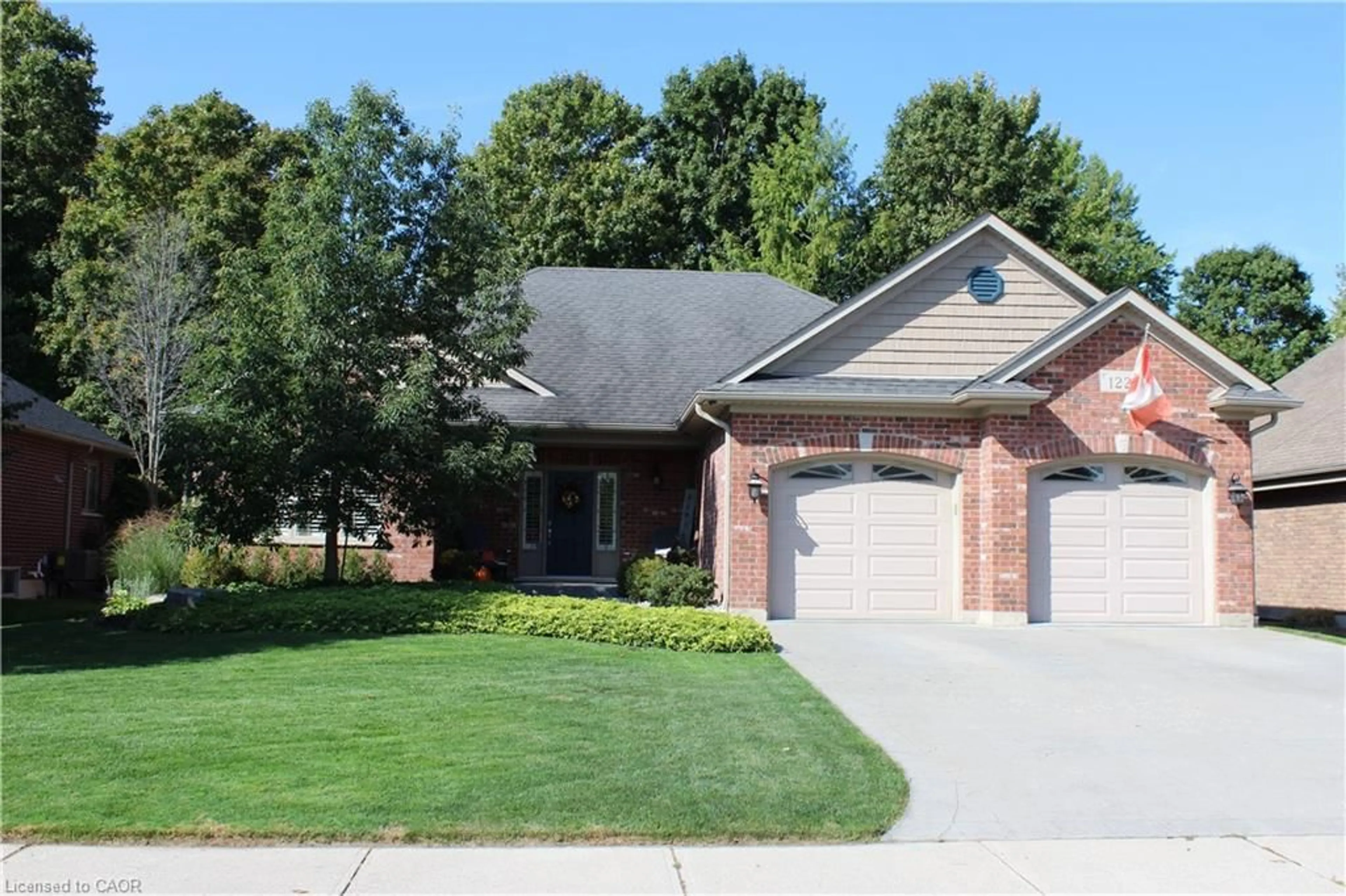 Home with brick exterior material, street for 122 Donjon Blvd, Port Dover Ontario N0A 1N7