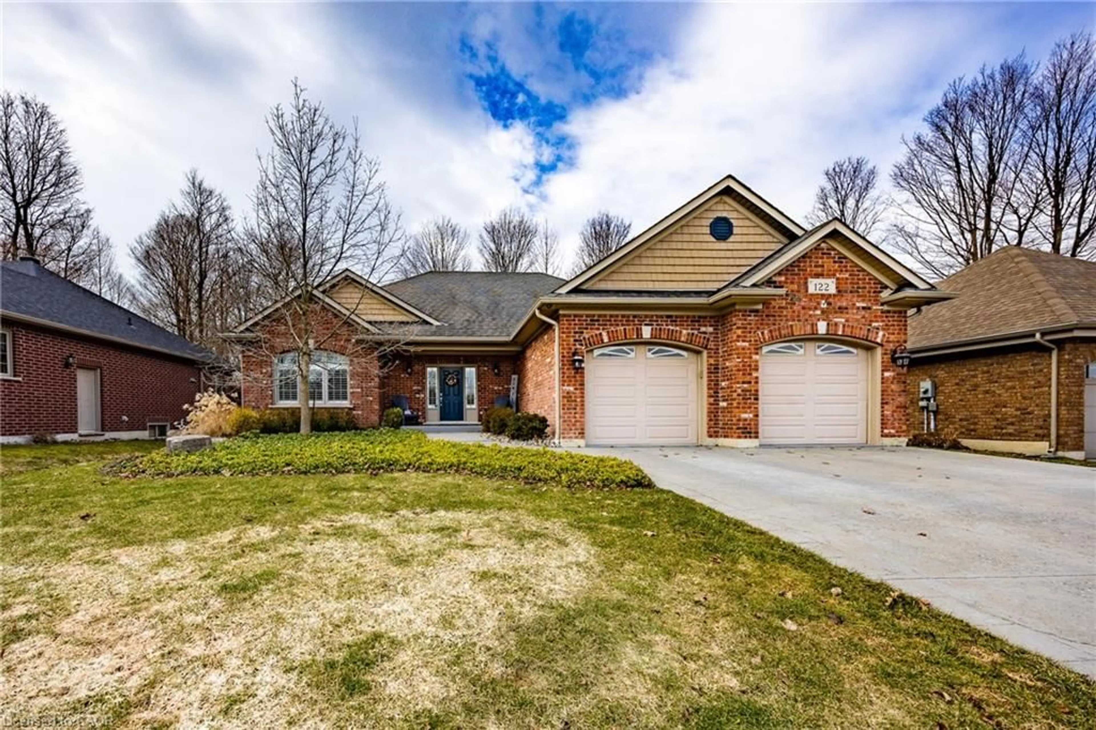 Home with brick exterior material, street for 122 Donjon Blvd, Port Dover Ontario N0A 1N7