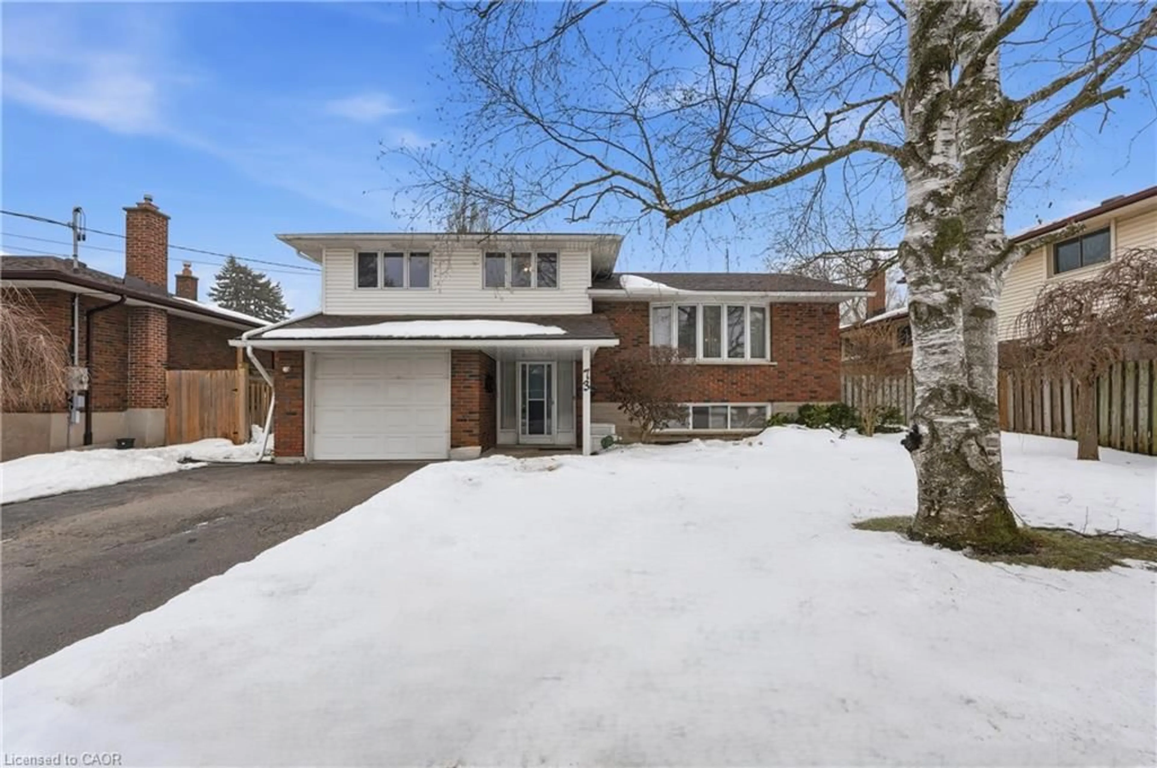 Home with brick exterior material, street for 73 Brentwood Dr, Guelph Ontario N1H 5M8