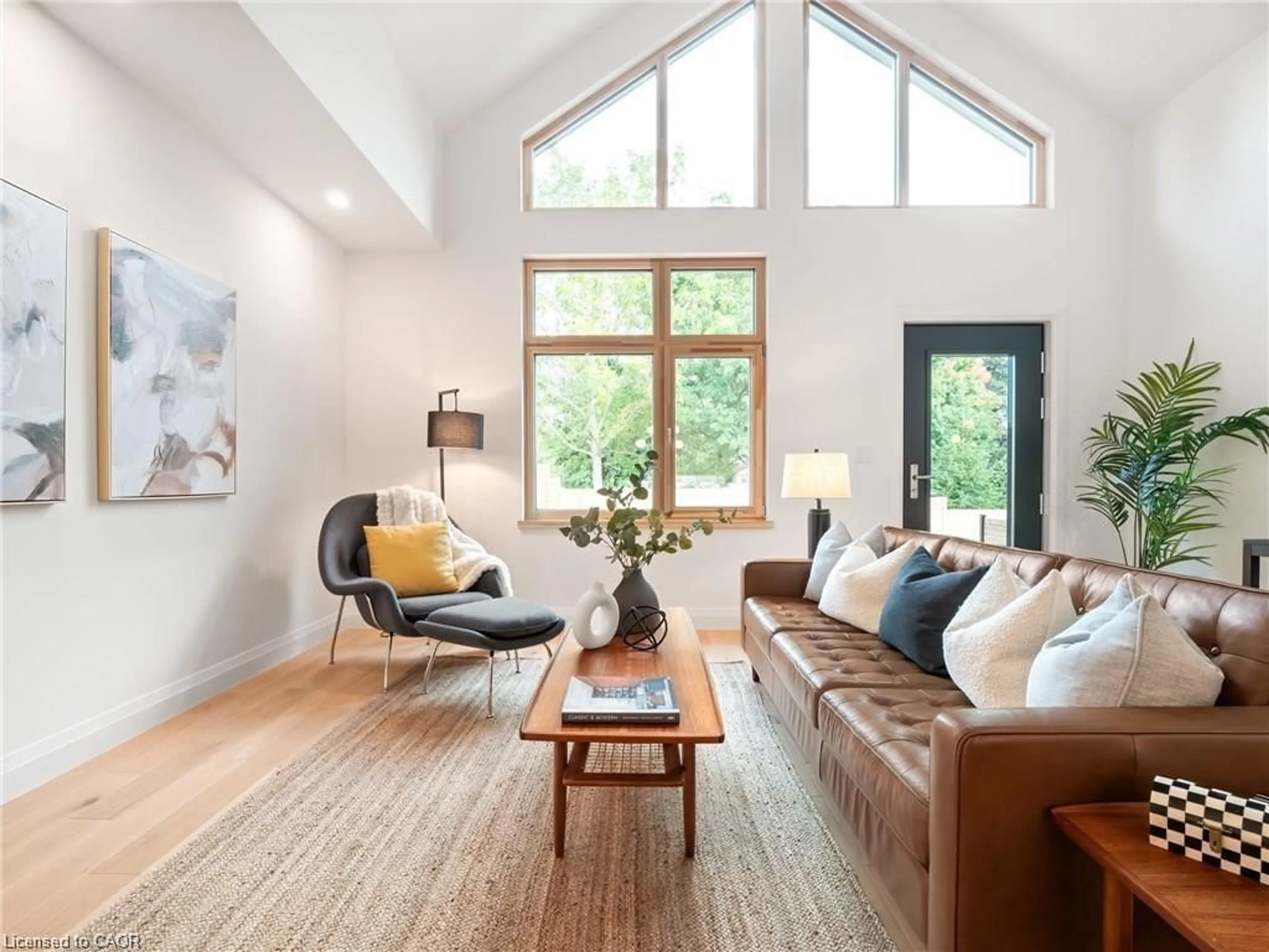 Living room with furniture, wood/laminate floor for 98 Elgin St, Embro Ontario N0J 1J0