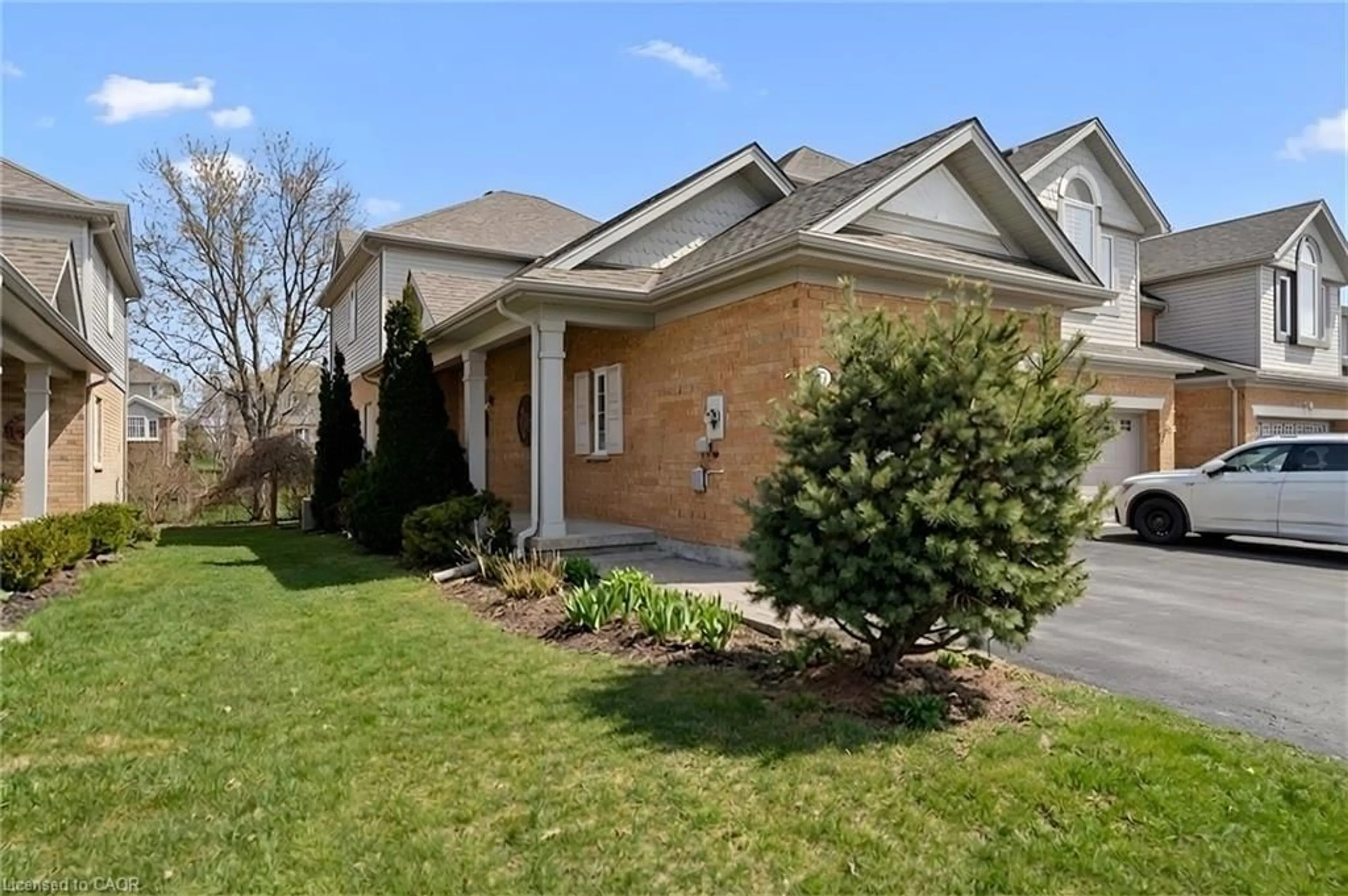 Home with brick exterior material, street for 23 Spencer Cres, Guelph Ontario N1L 1M2
