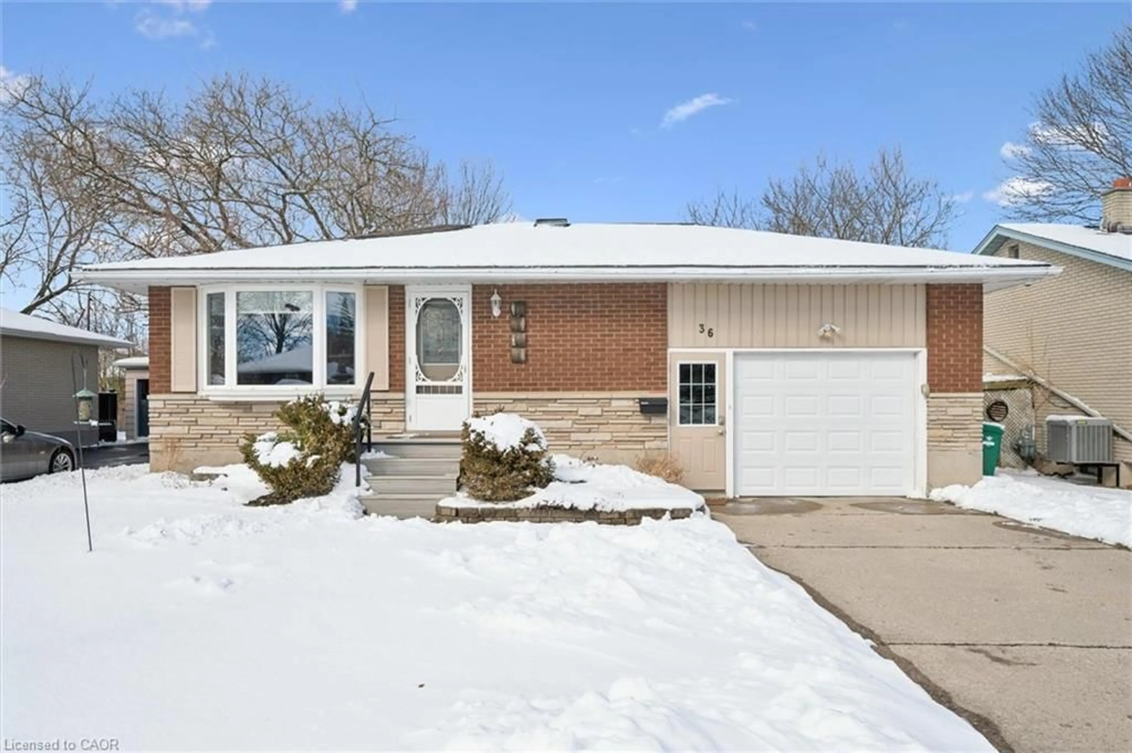 Home with brick exterior material, street for 36 Bluejay Rd, Elmira Ontario N3B 1J4
