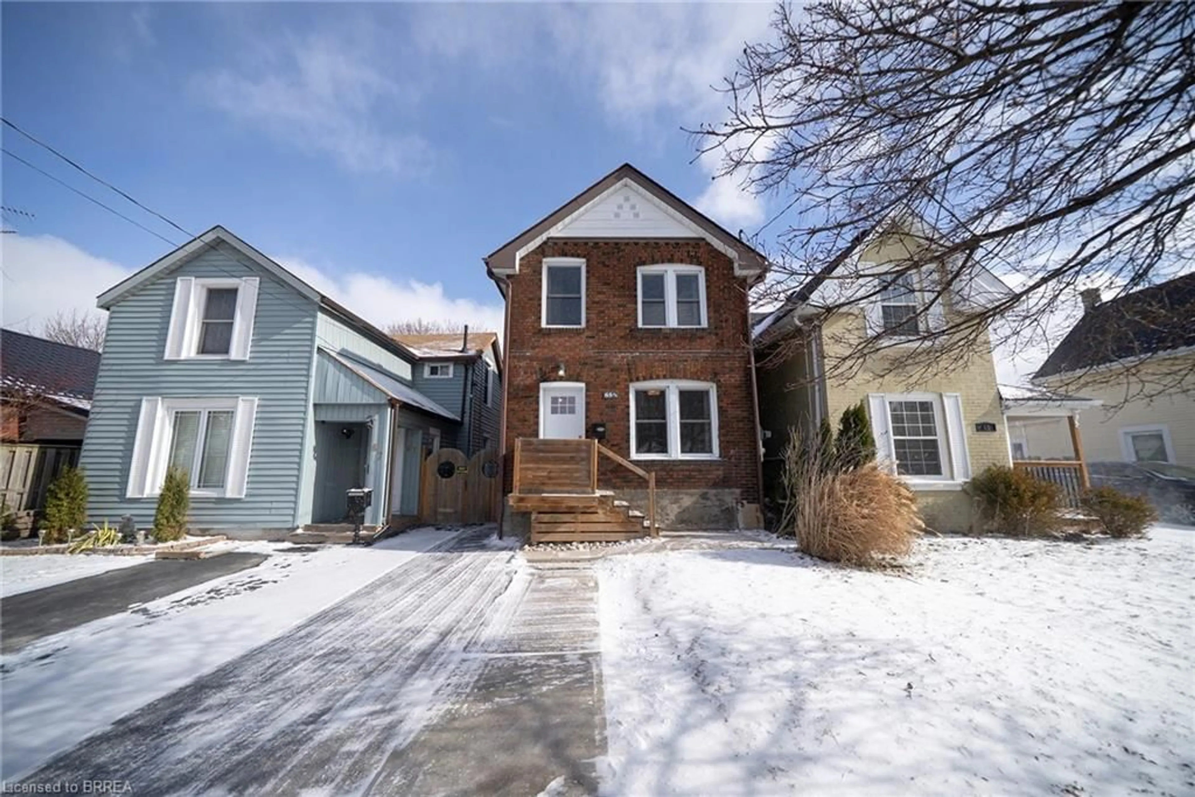 Home with brick exterior material, street for 65 1/2 Dundas St, Brantford Ontario N3R 1S2