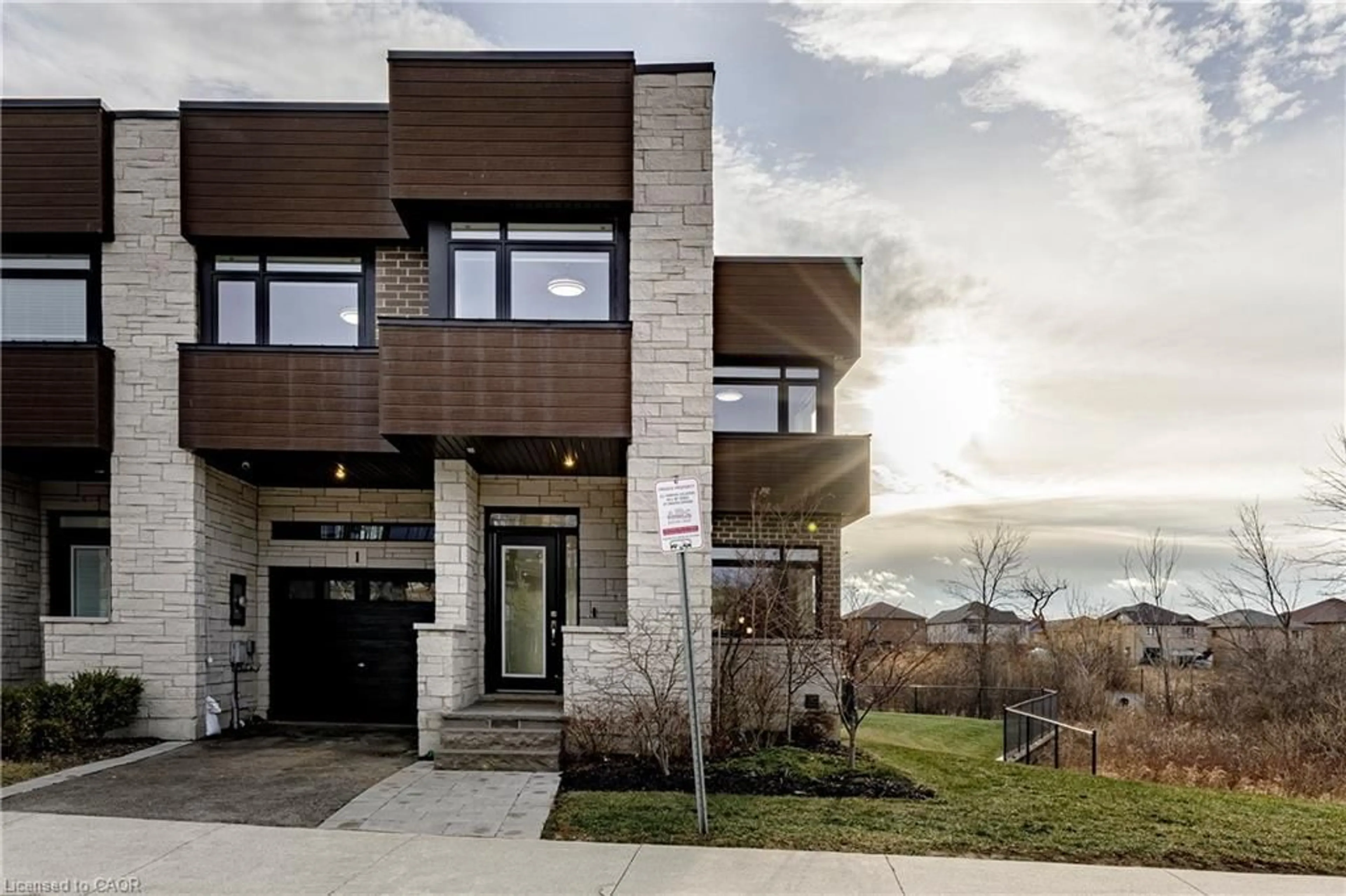 Home with brick exterior material, street for 35 Midhurst Hts #1, Hamilton Ontario L8J 0K9