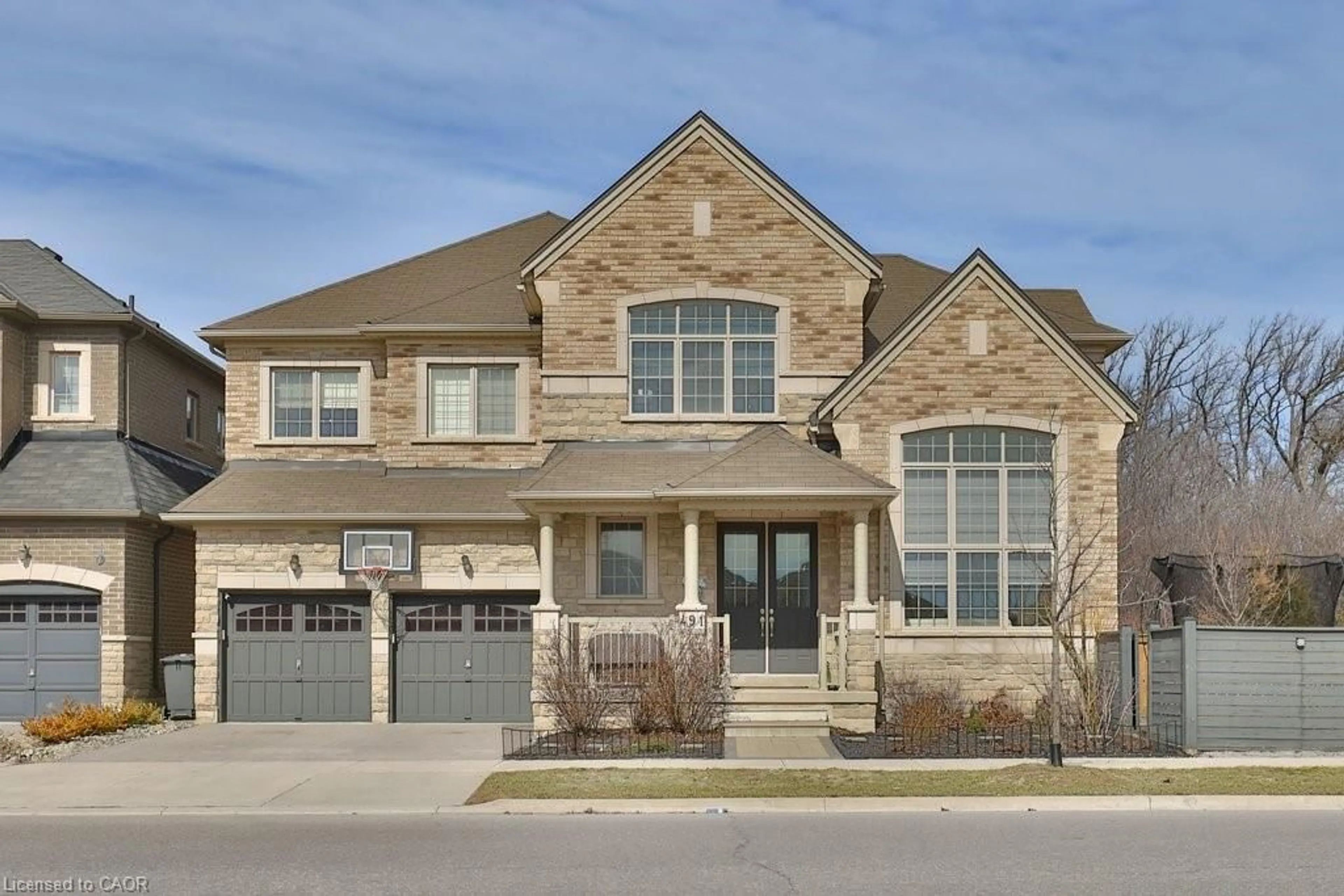 Home with brick exterior material, street for 491 Threshing Mill Blvd, Oakville Ontario L6H 7H5