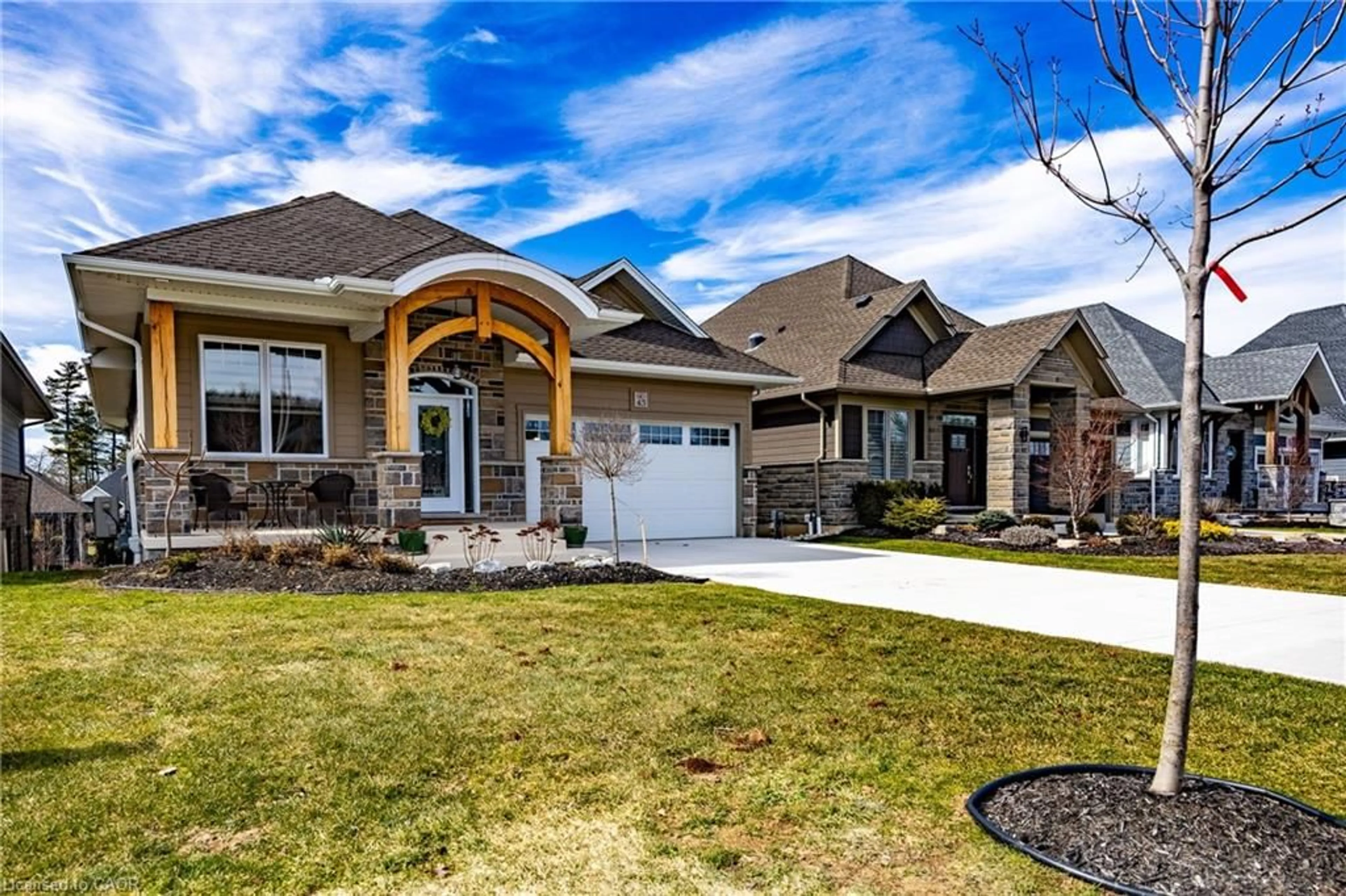 Home with brick exterior material, street for 45 Bluenose Dr, Port Dover Ontario N0A 1N7