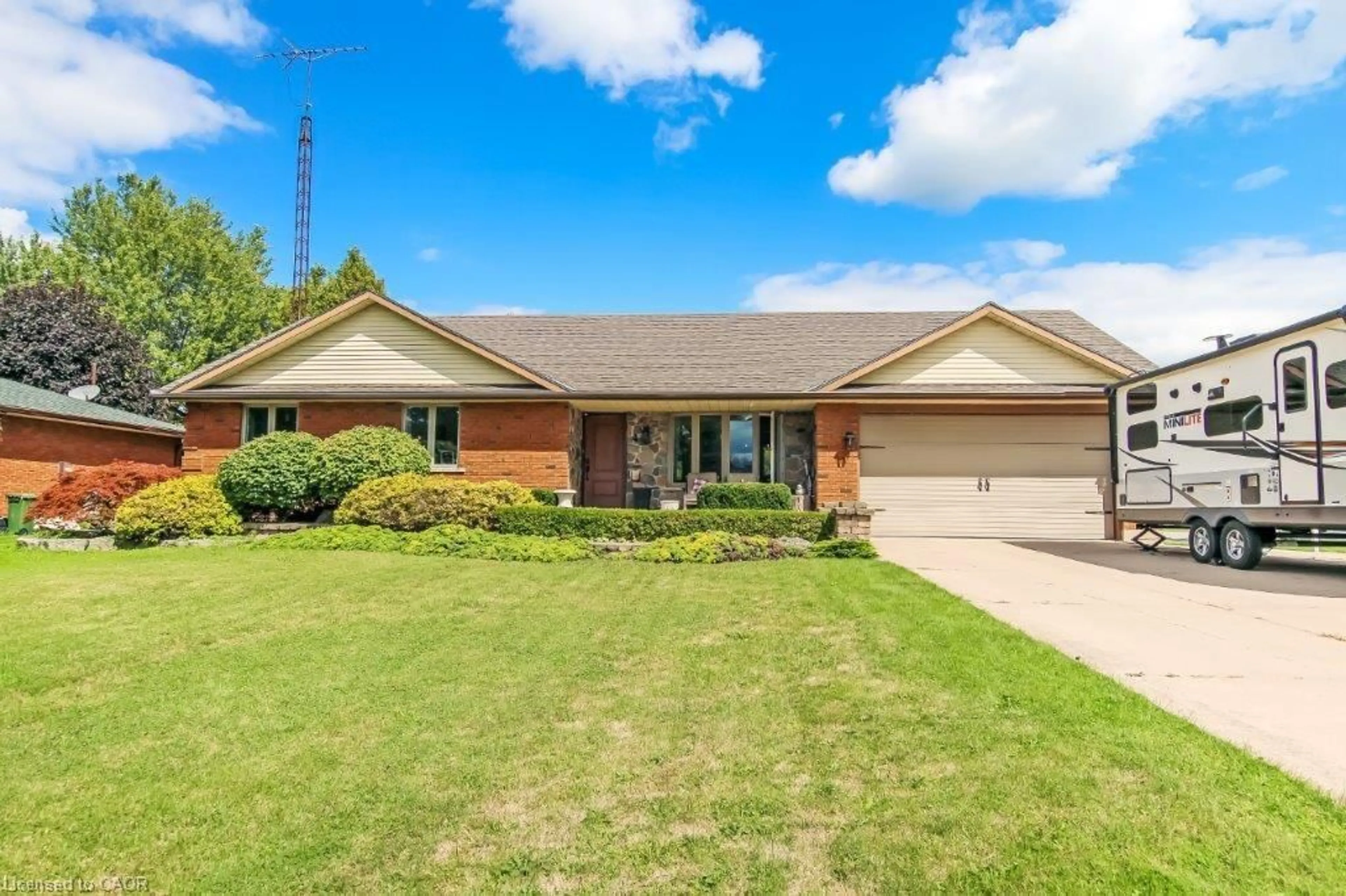 Home with brick exterior material, street for 4 Donjon Blvd, Port Dover Ontario N0A 1N7