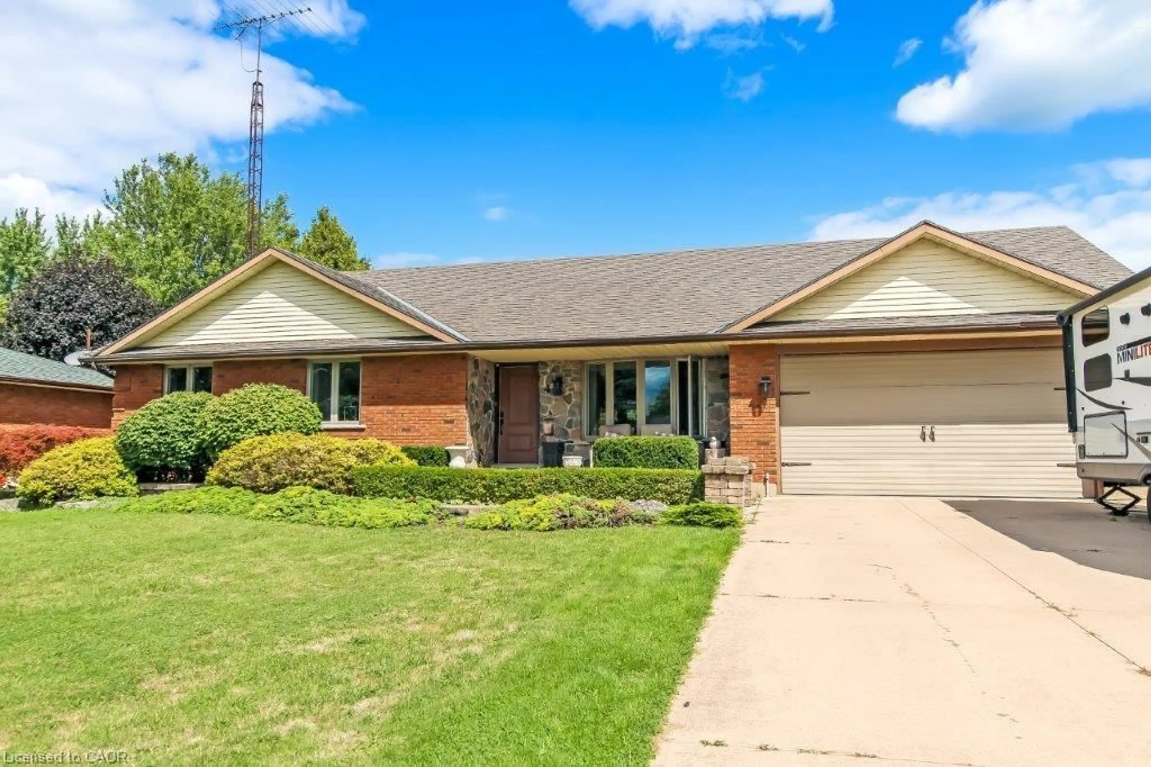 Home with brick exterior material, street for 4 Donjon Blvd, Port Dover Ontario N0A 1N7