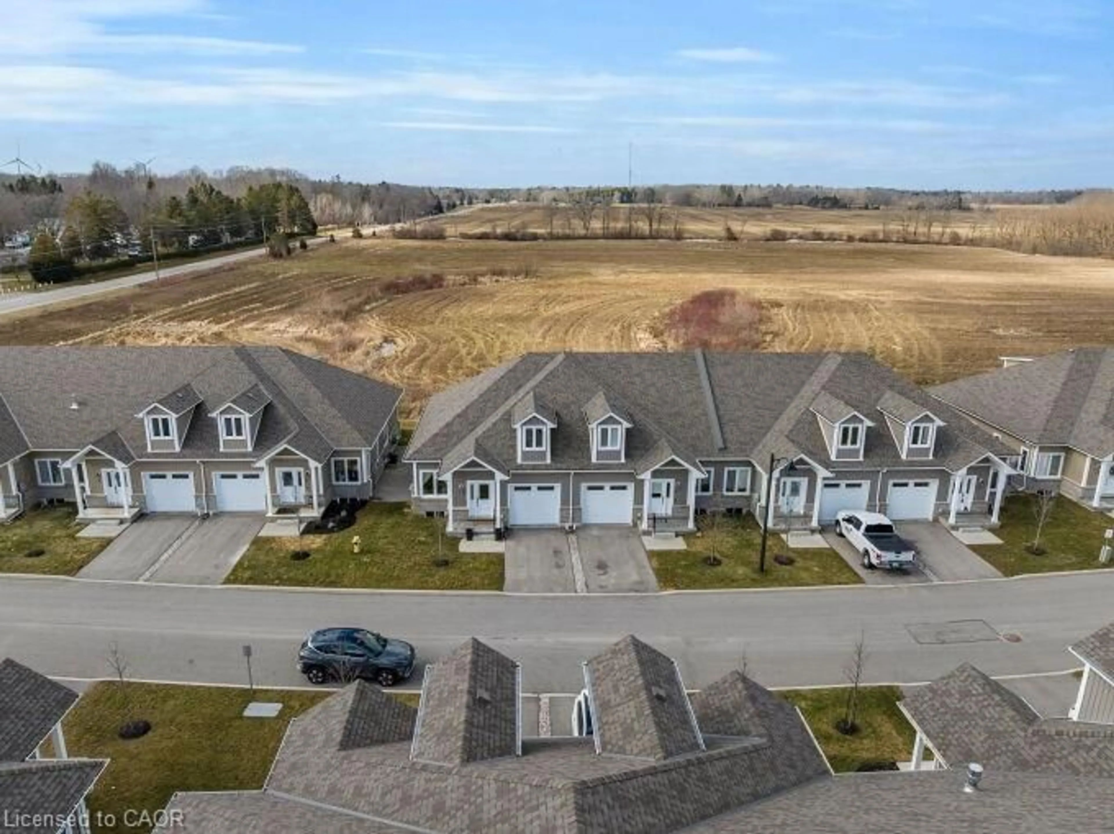 A pic from outside/outdoor area/front of a property/back of a property/a pic from drone, street for 744 Nelson St #7, Port Dover Ontario N0A 1N0