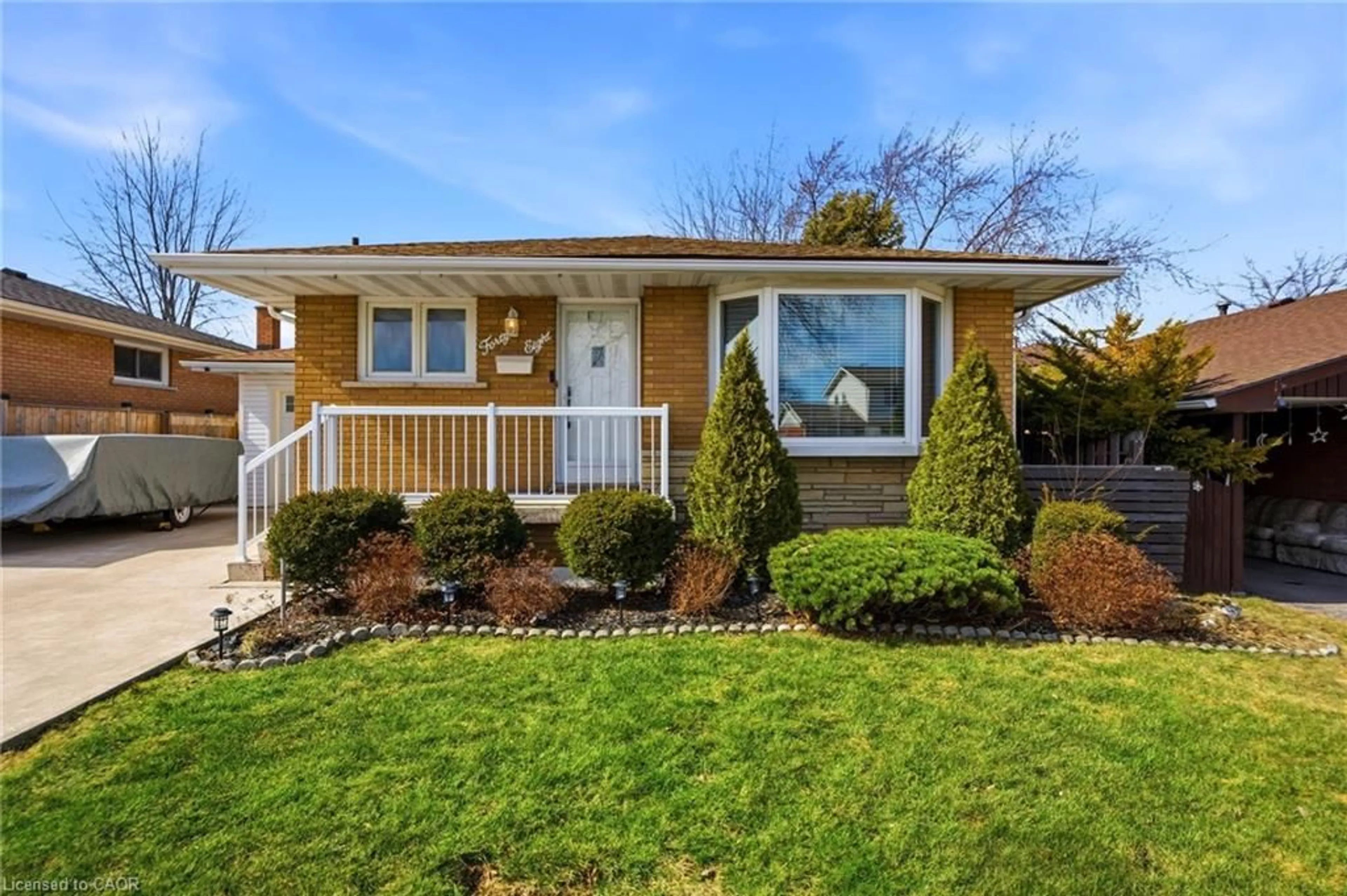 Home with vinyl exterior material, street for 48 Champlain Ave, Hamilton Ontario L8G 2H7