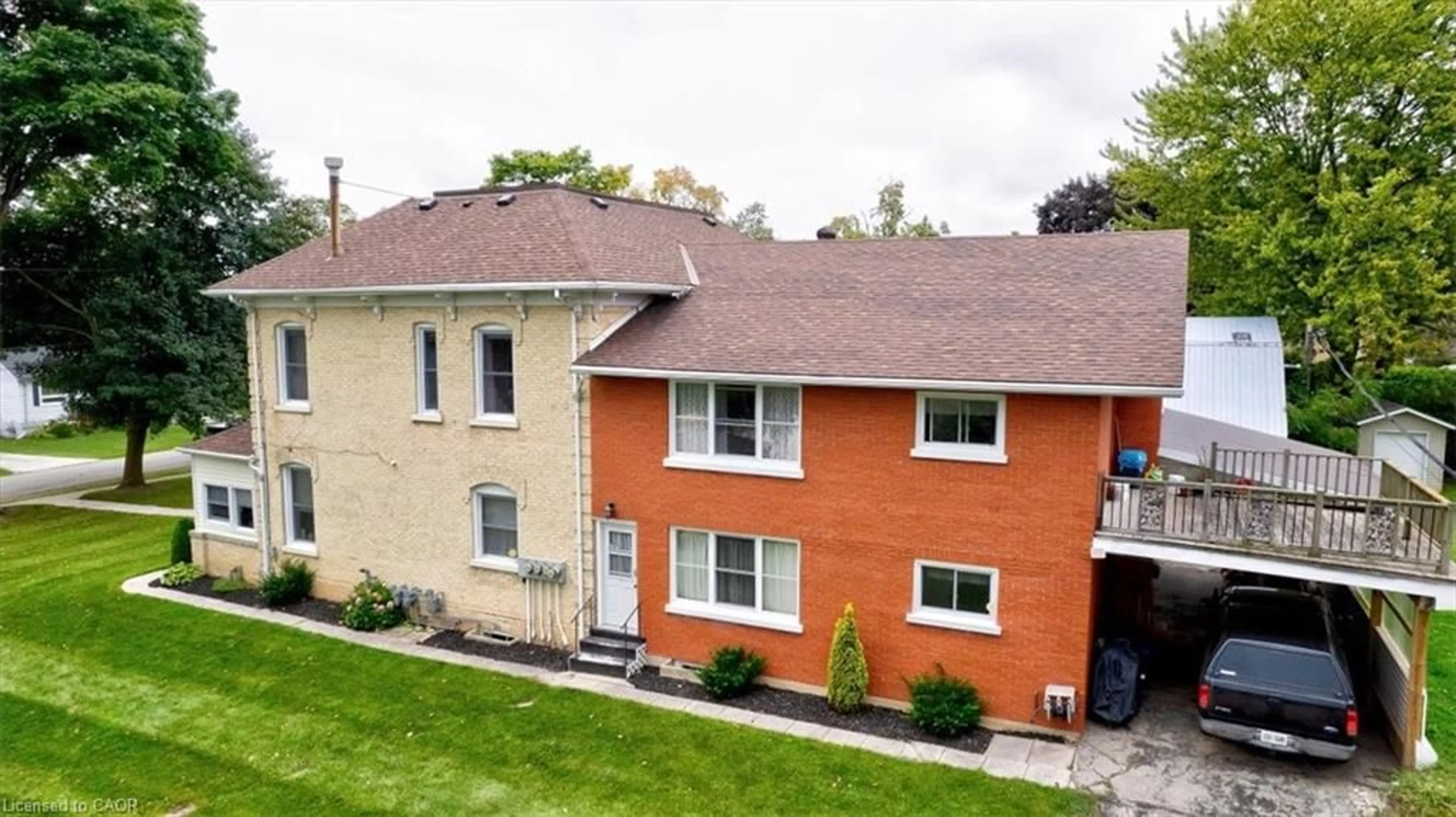 A pic from outside/outdoor area/front of a property/back of a property/a pic from drone, street for 163 John St, Harriston Ontario N0G 1Z0