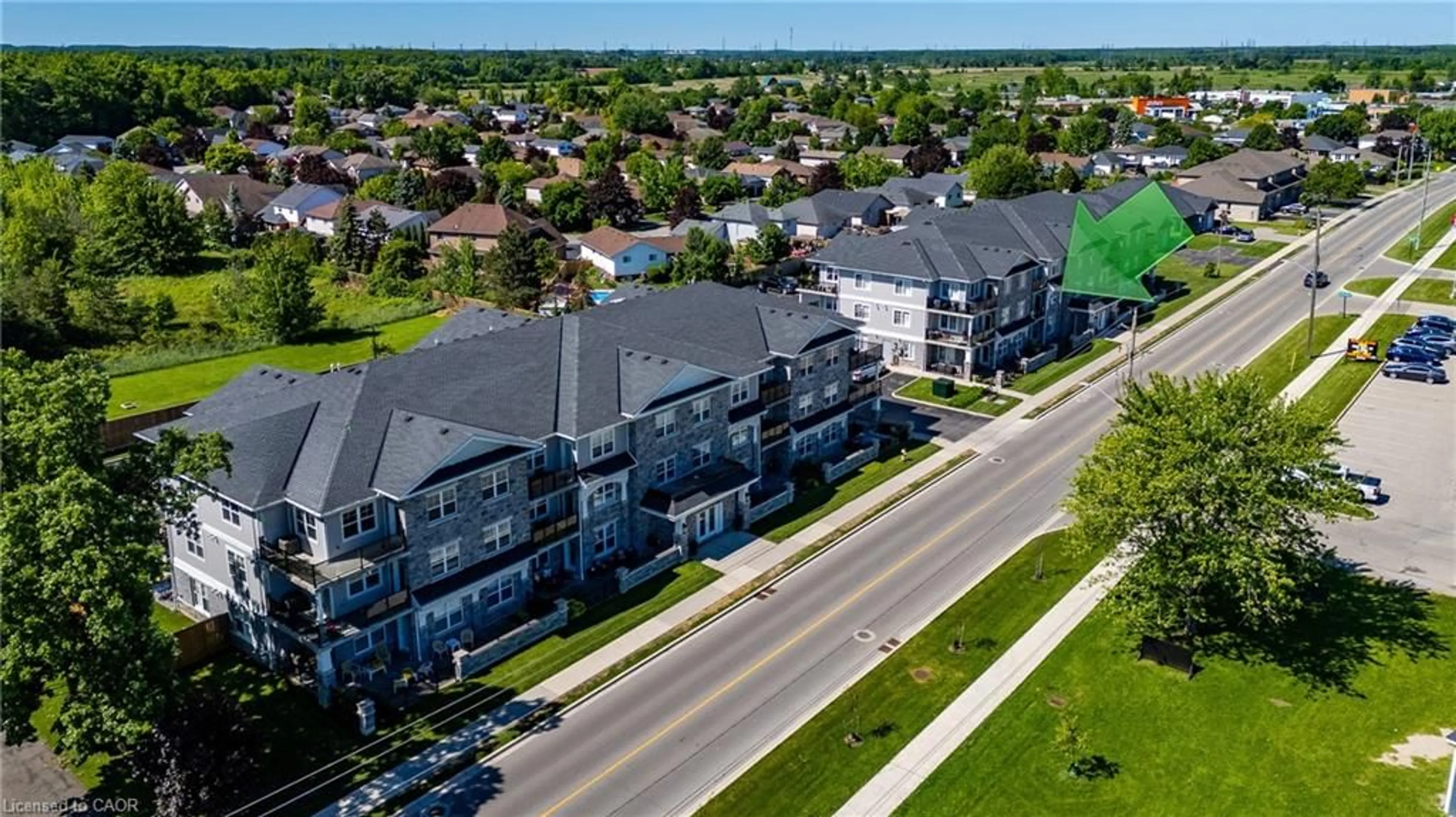 A pic from outside/outdoor area/front of a property/back of a property/a pic from drone, unknown for 65 Haddington St #203, Caledonia Ontario N3W 2H2