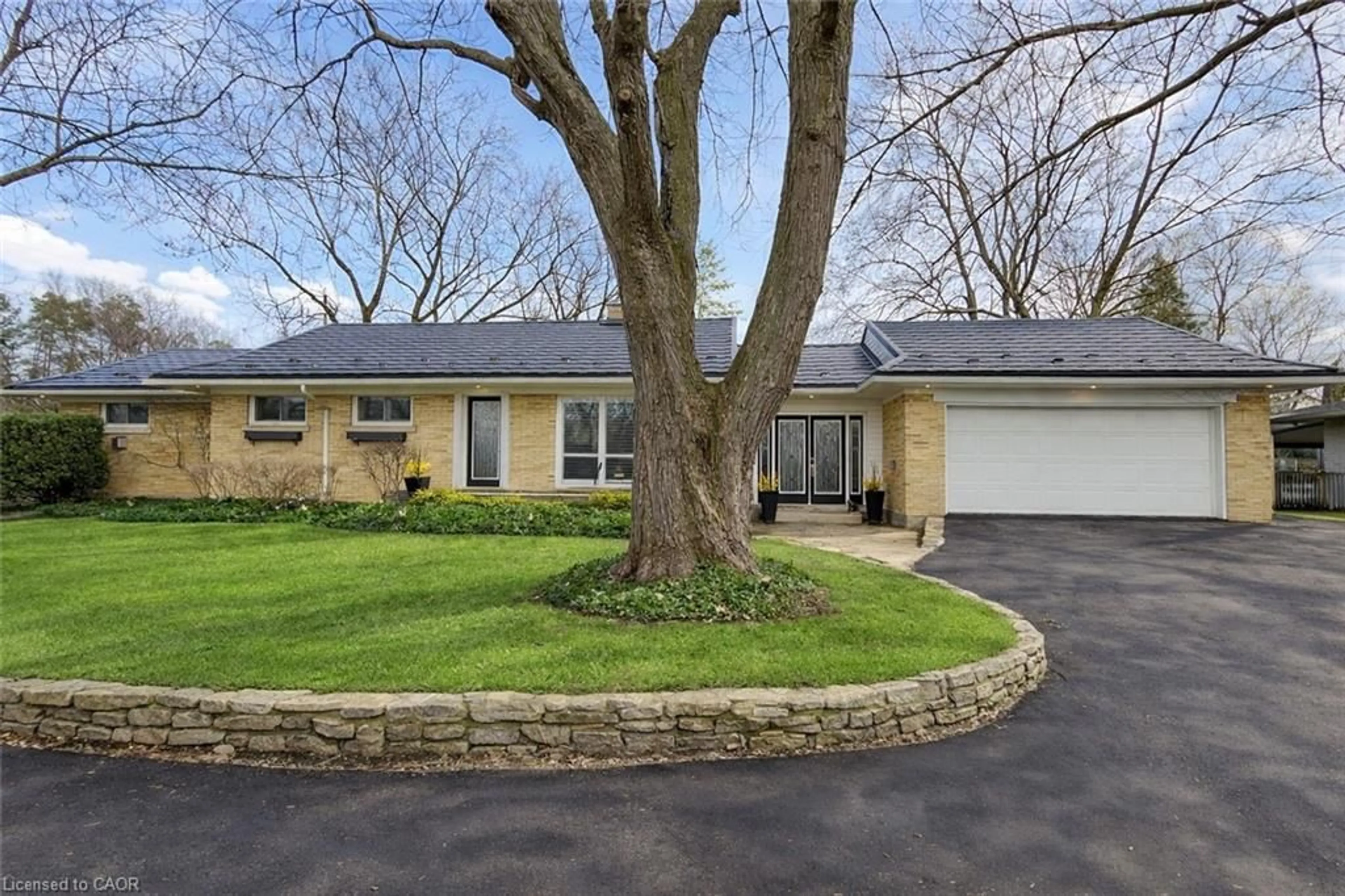 Home with brick exterior material, street for 243 Lincoln Rd, Waterloo Ontario N2J 2P4