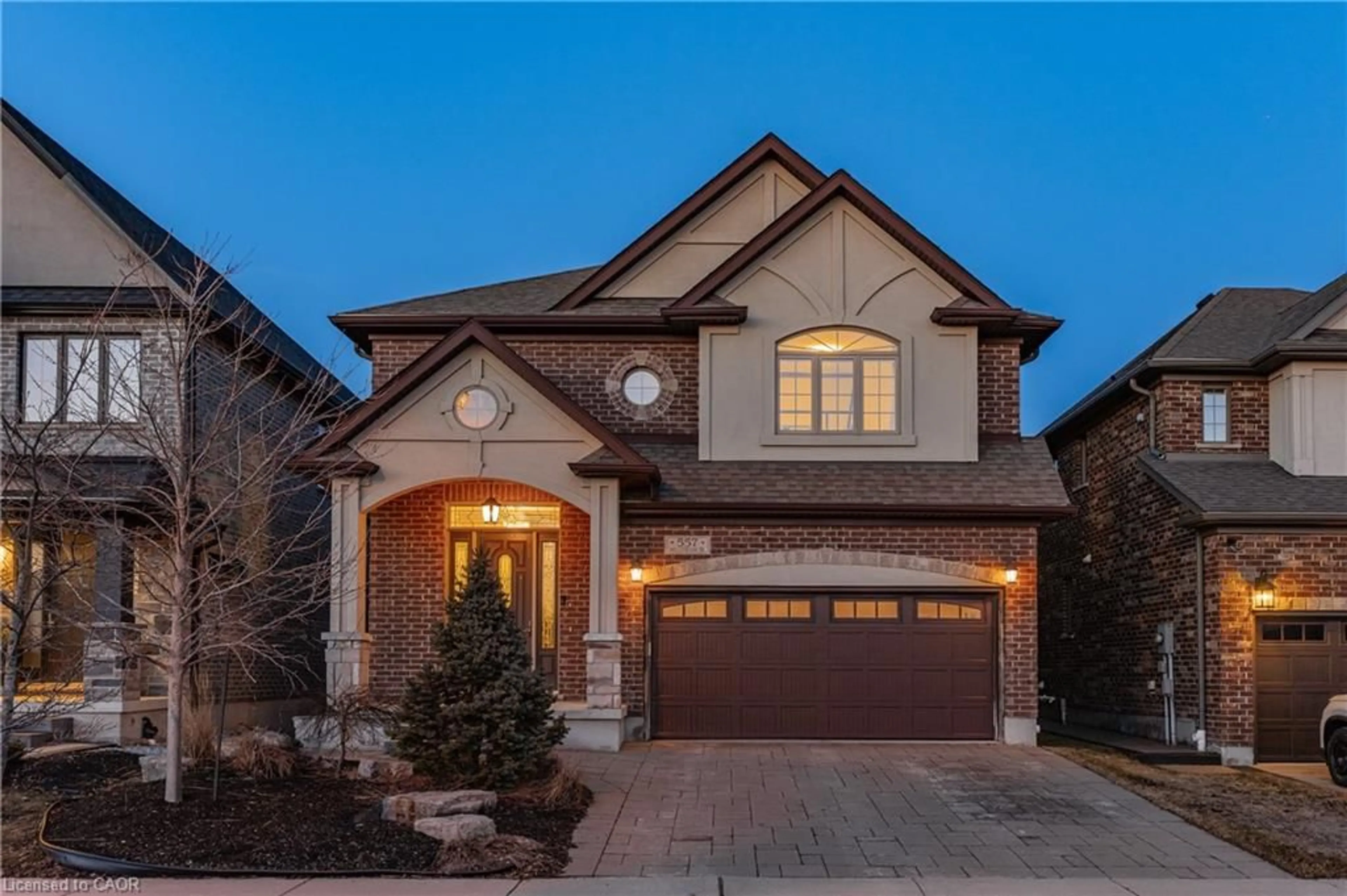 Home with brick exterior material, street for 557 Millstream Dr, Waterloo Ontario N2K 0E1
