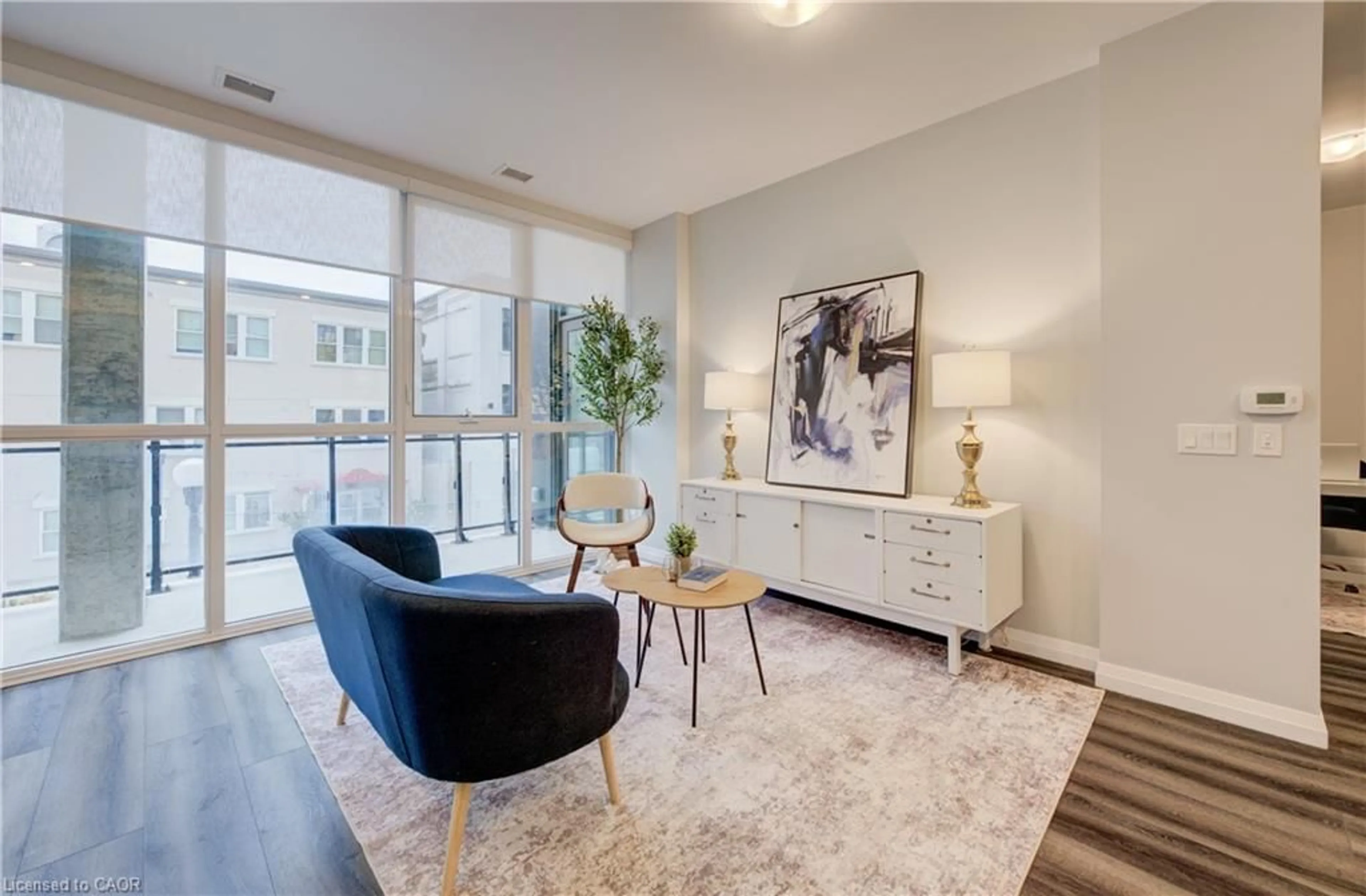 Living room with furniture, unknown for 60 Charles St #201, Kitchener Ontario N2G 0C9