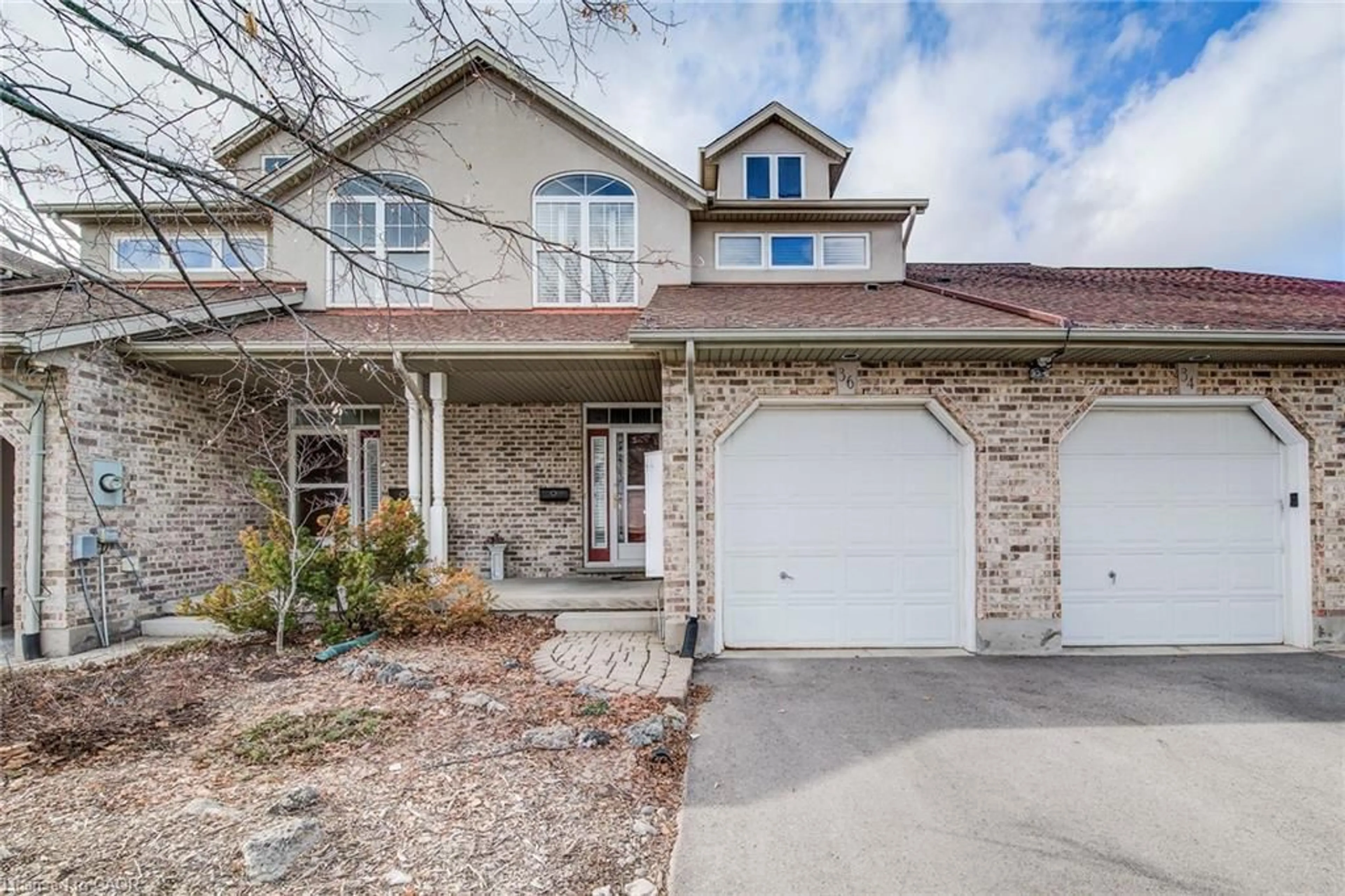 Home with brick exterior material, street for 36 Norman St, Waterloo Ontario N2L 6L5