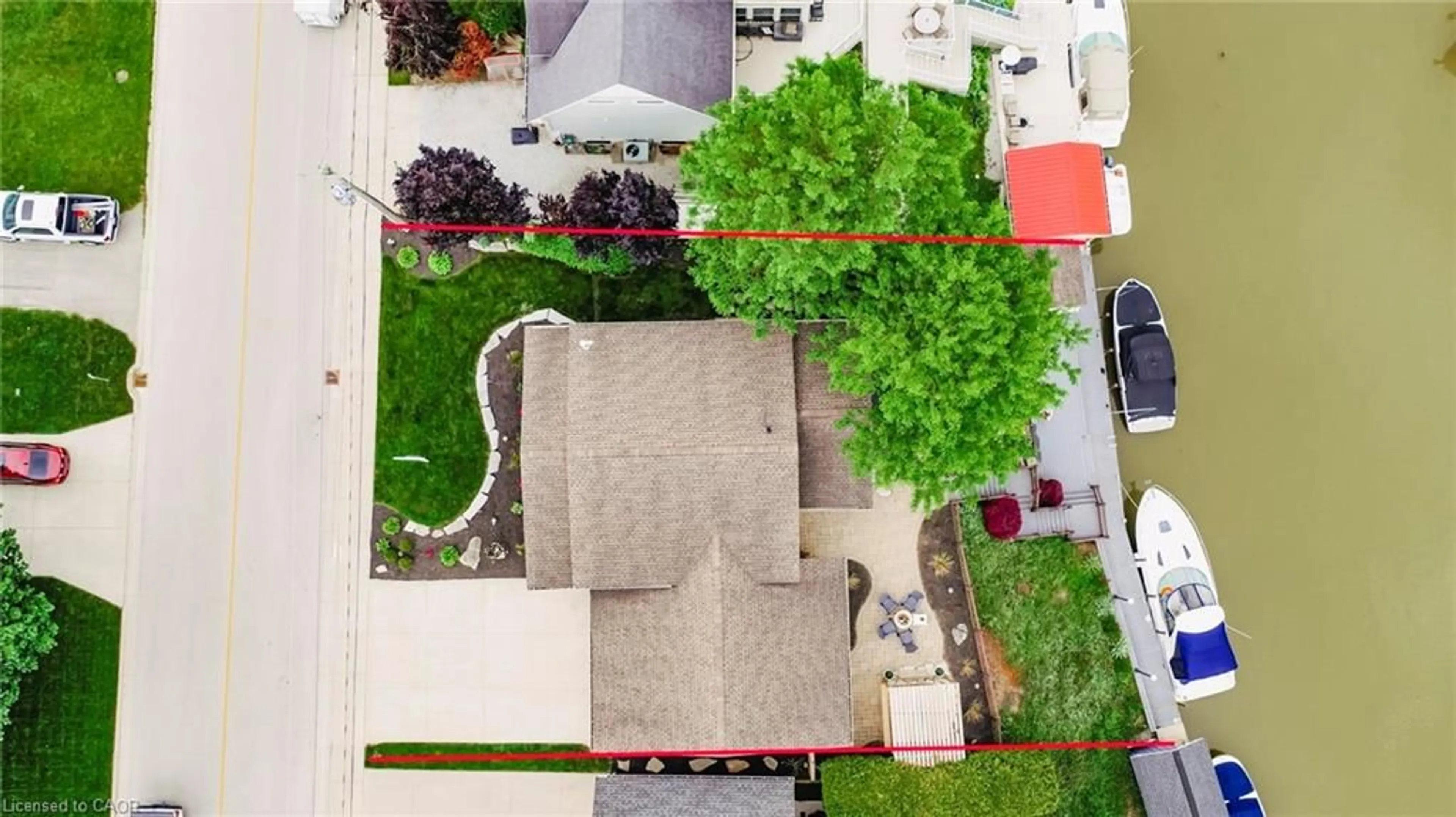 A pic from outside/outdoor area/front of a property/back of a property/a pic from drone, street for 49 Gill Rd Rd, Grand Bend Ontario N0M 1T0