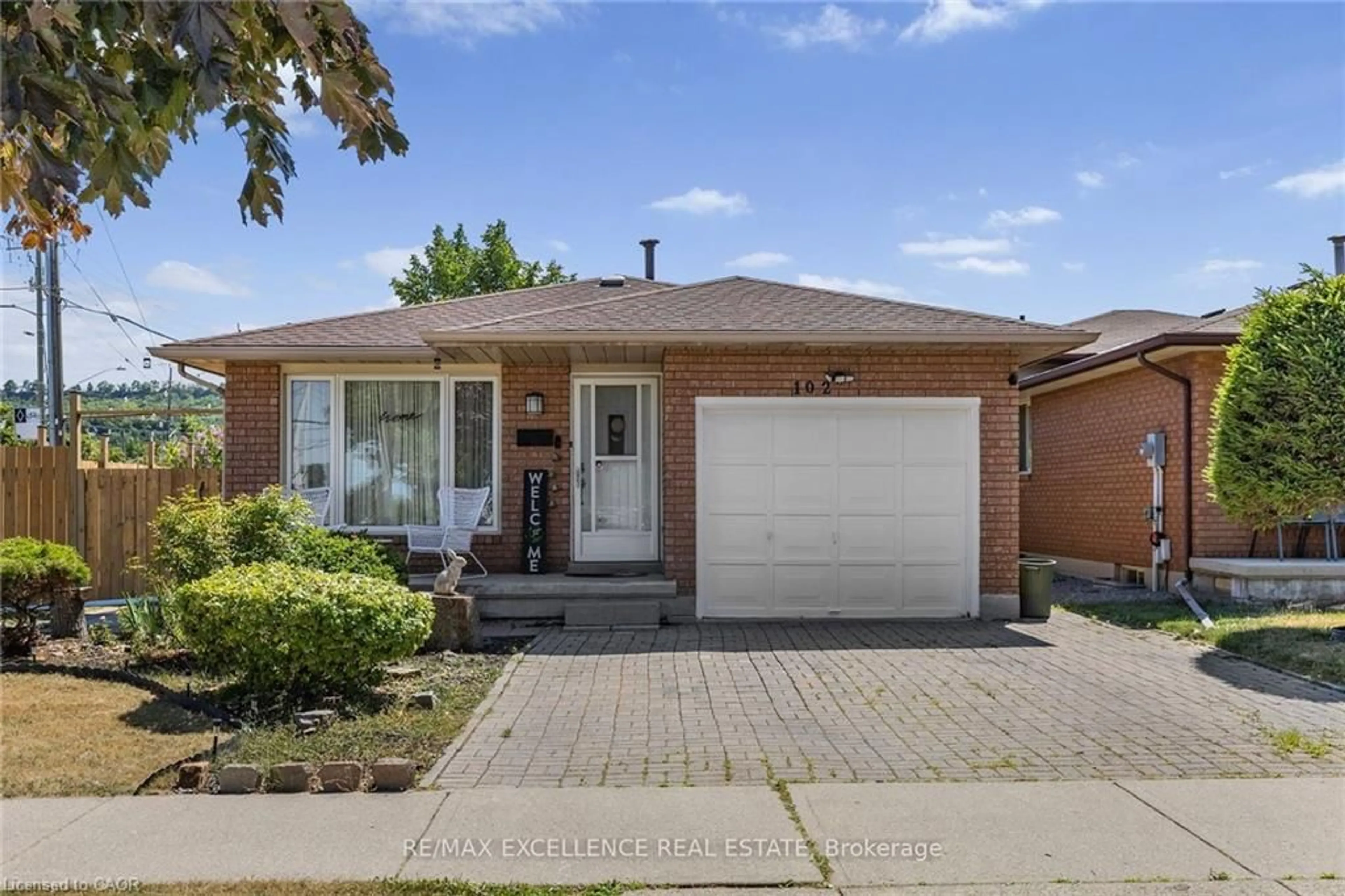 Home with brick exterior material, street for 102 Juniper Dr, Hamilton Ontario L8E 4G6