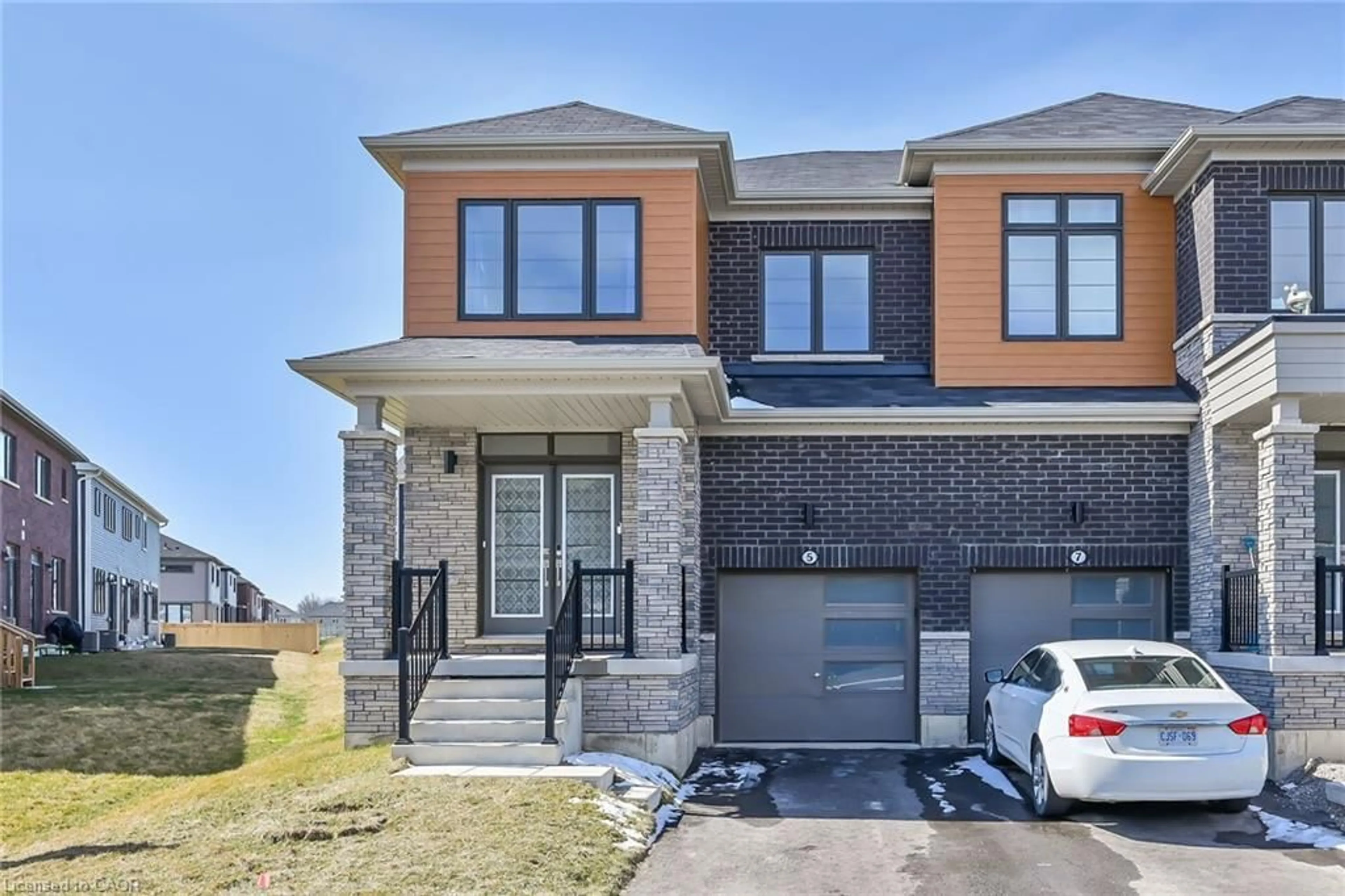 Home with brick exterior material, street for 5 Owl Lane, Caledonia Ontario N3W 0G4