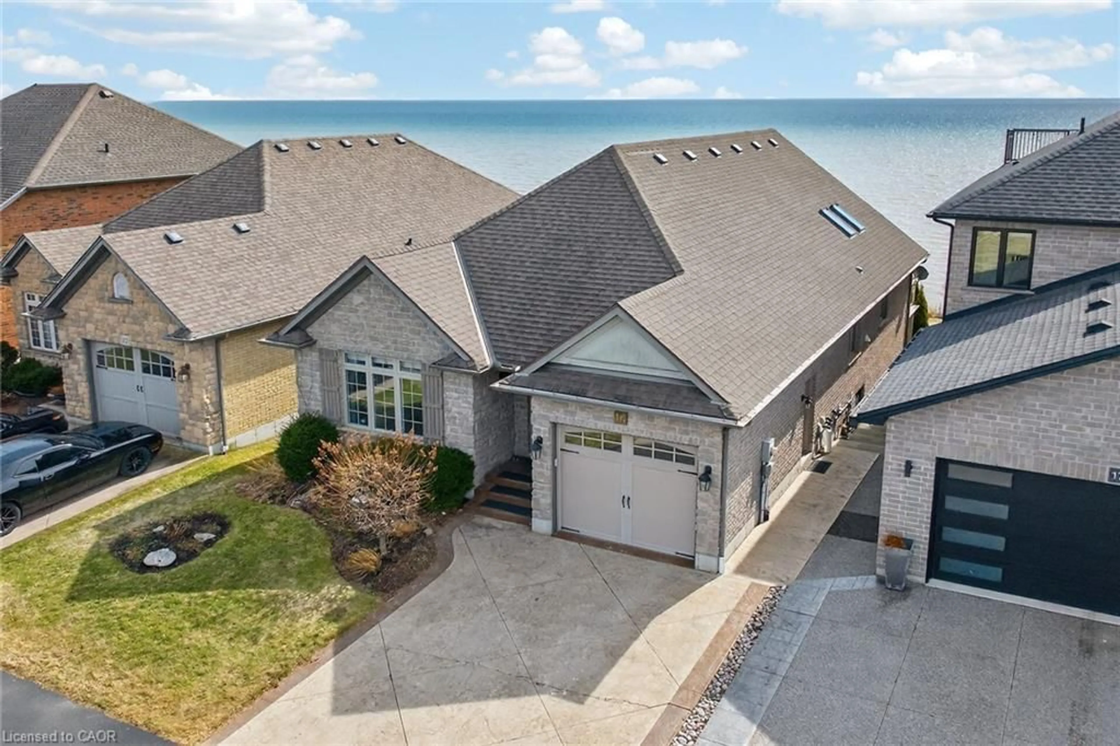 A pic from outside/outdoor area/front of a property/back of a property/a pic from drone, water/lake/river/ocean view for 80 New Lakeshore Rd #16, Port Dover Ontario N0A 1N8