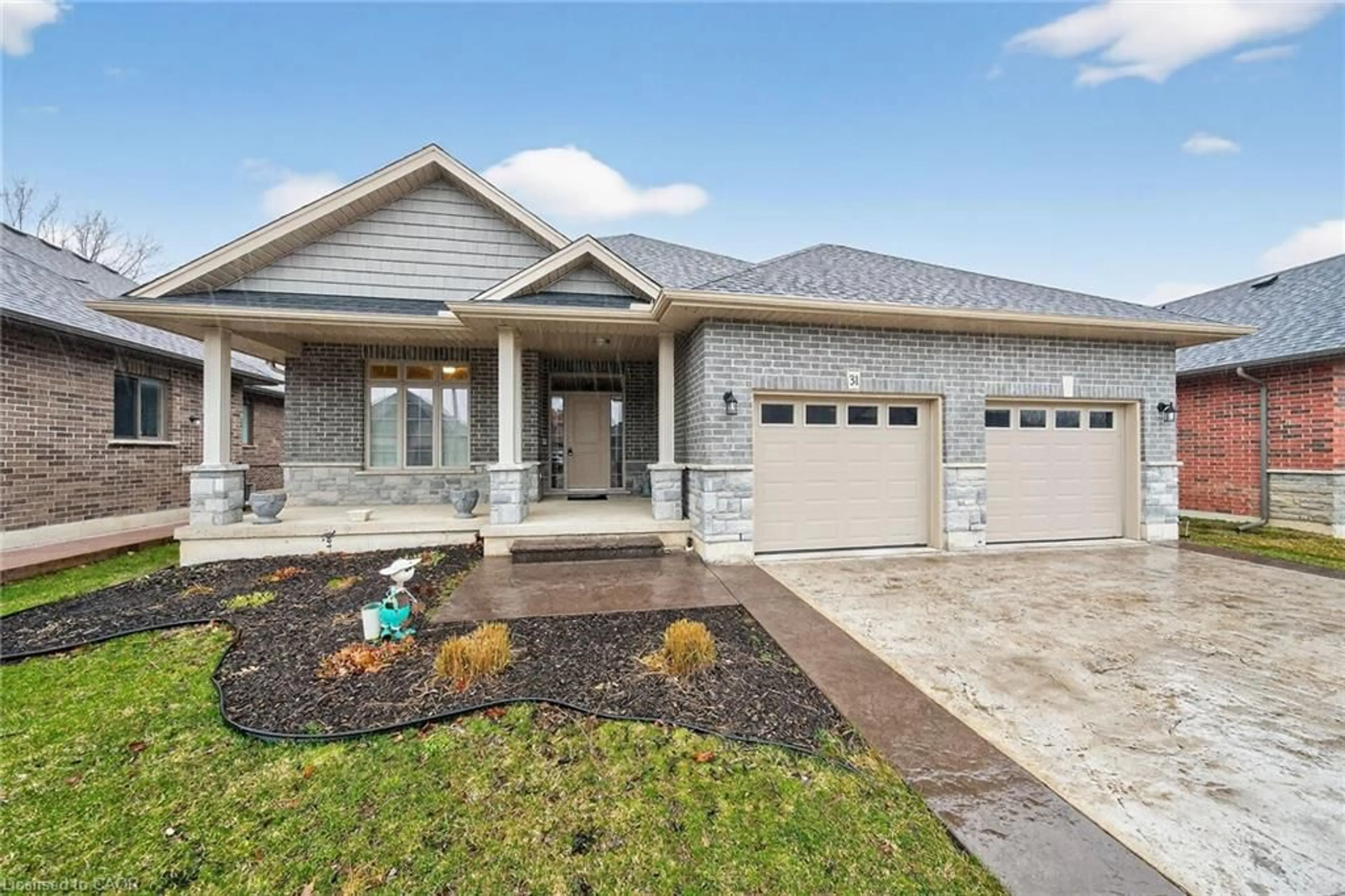 Home with brick exterior material, street for 31 Sycamore Dr, Port Dover Ontario N0A 1N6