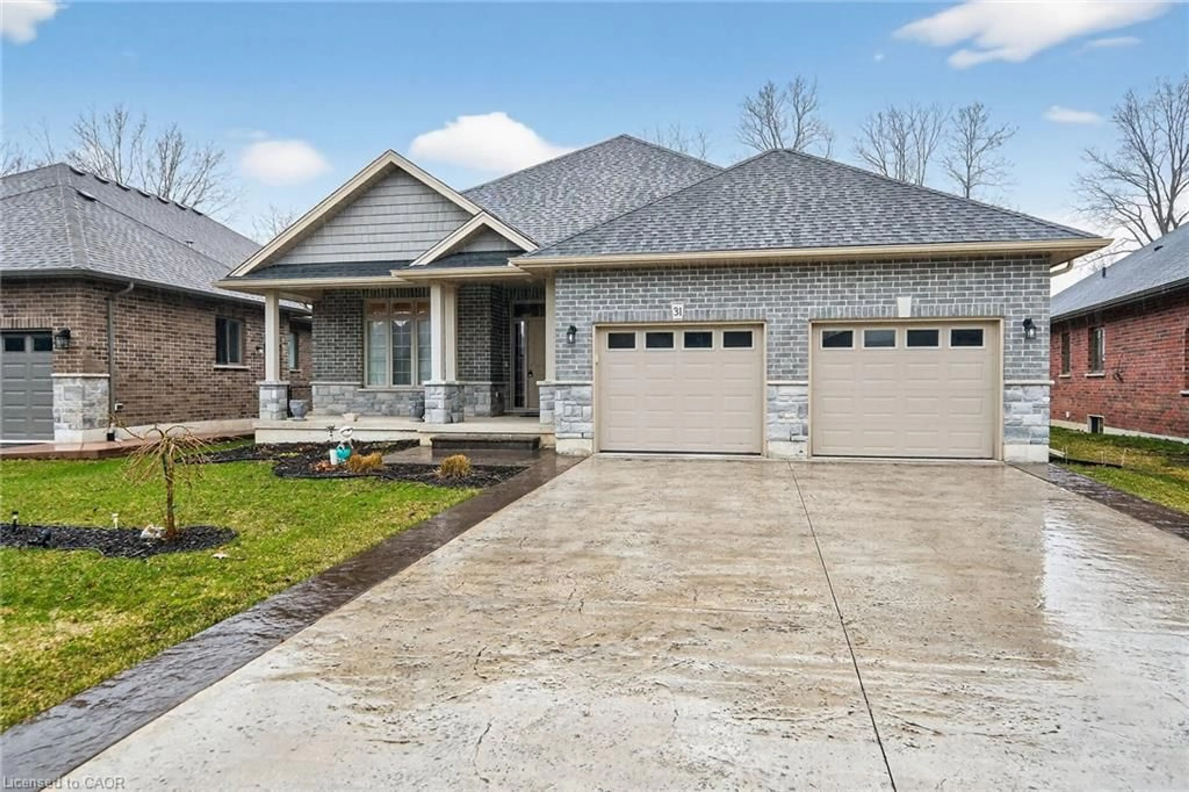 Home with brick exterior material, street for 31 Sycamore Dr, Port Dover Ontario N0A 1N6