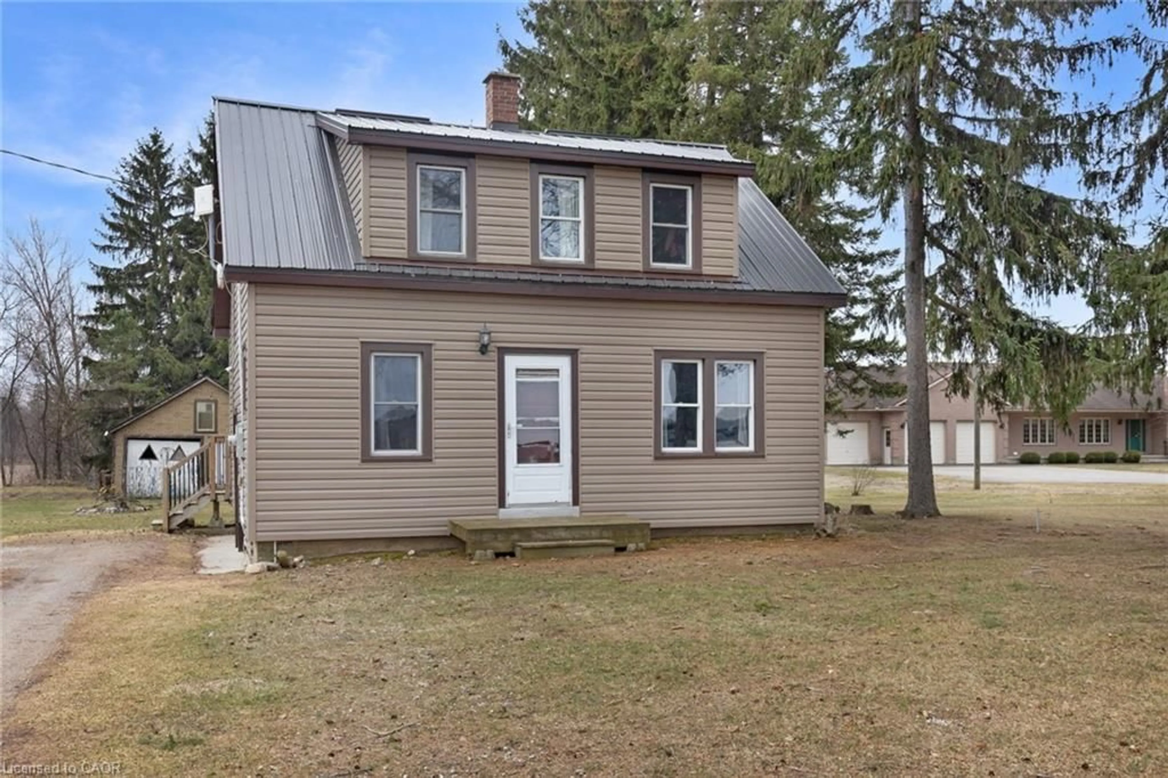 Home with vinyl exterior material, street for 1188 Windham Road 5, Vanessa Ontario N0E 1V0